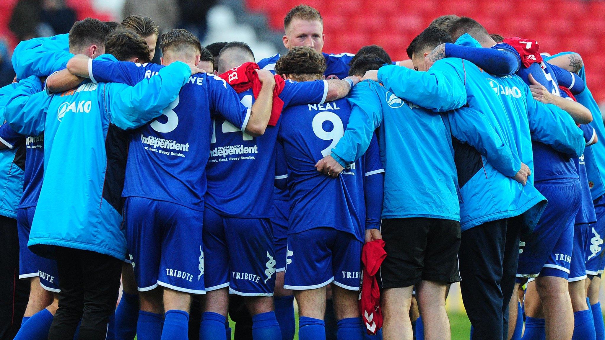 Truro City huddle after FA Cup loss at Charlton Athletic