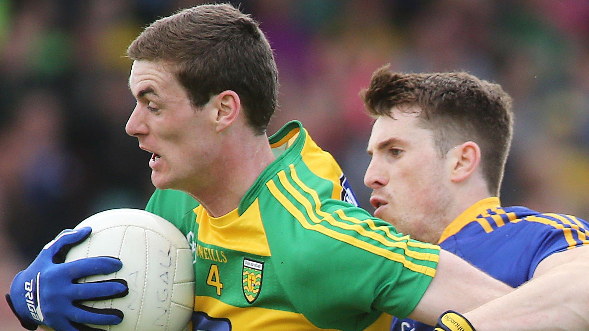 Donegal's Caolan Ward is challenged by Longford's Liam Connerton