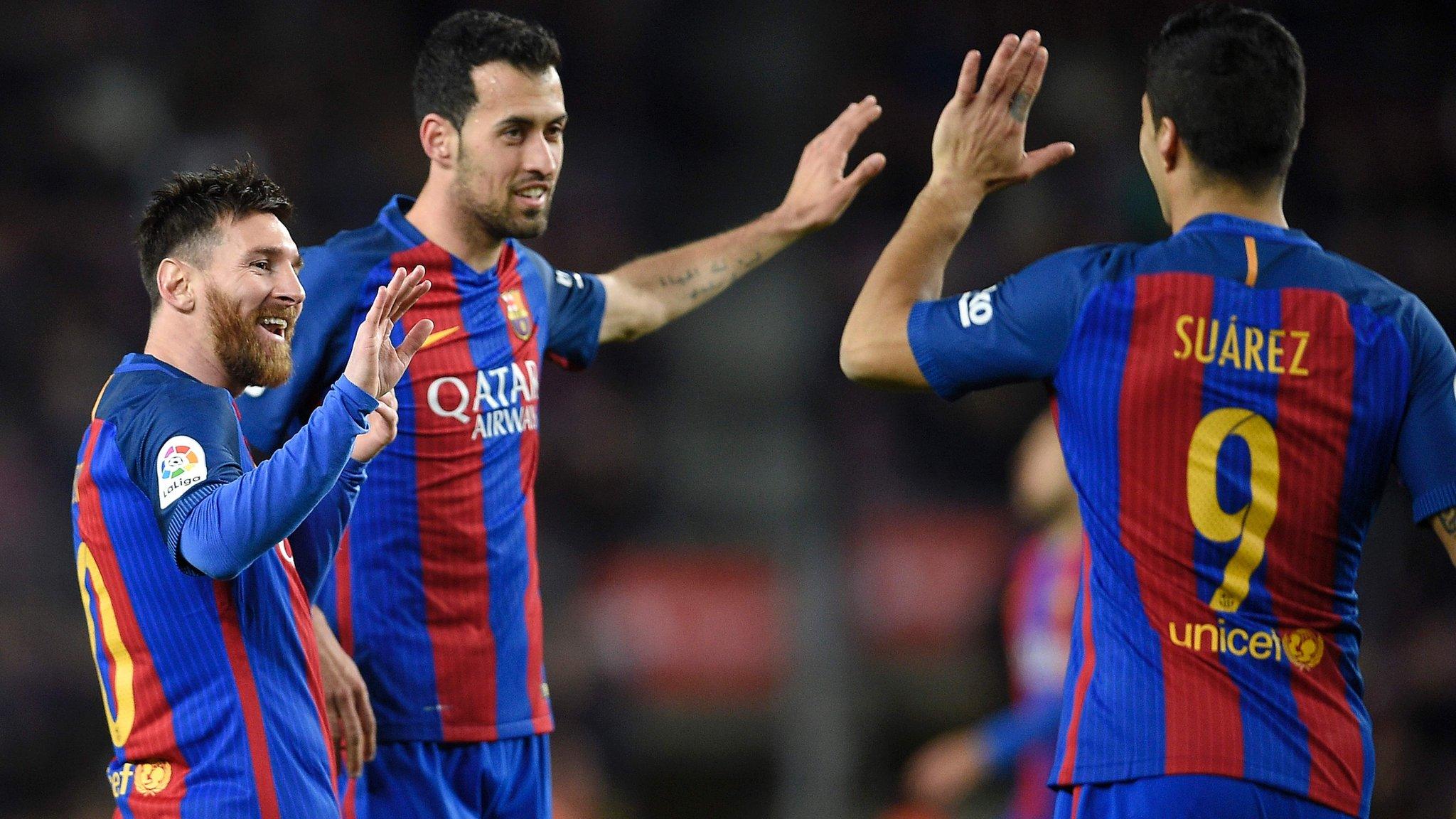 Barcelona's players celebrate scoring in the win against Sporting Gijon