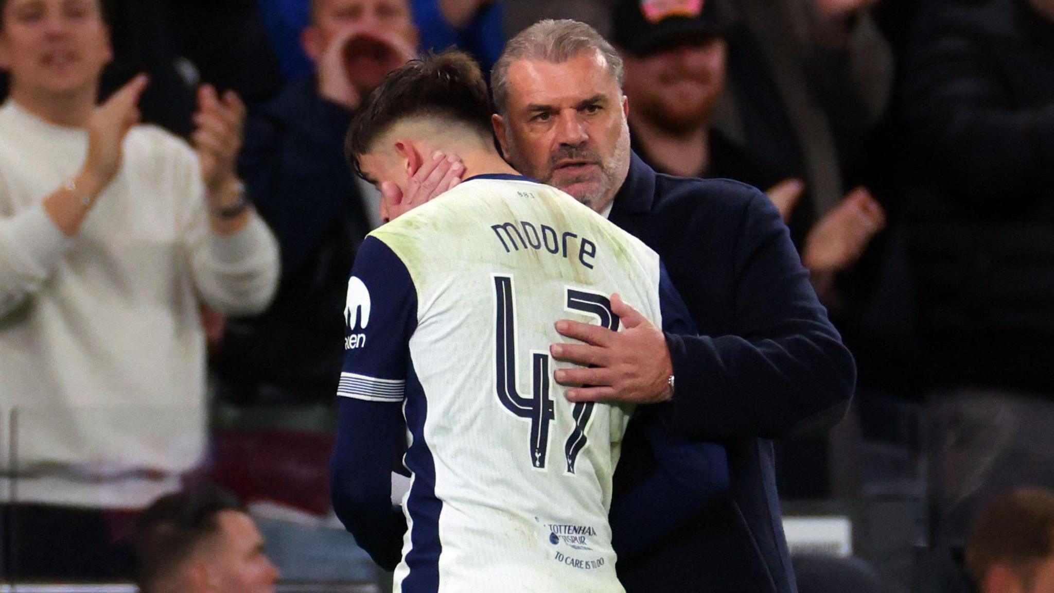 Ange Postecoglou hugs Mikey Moore