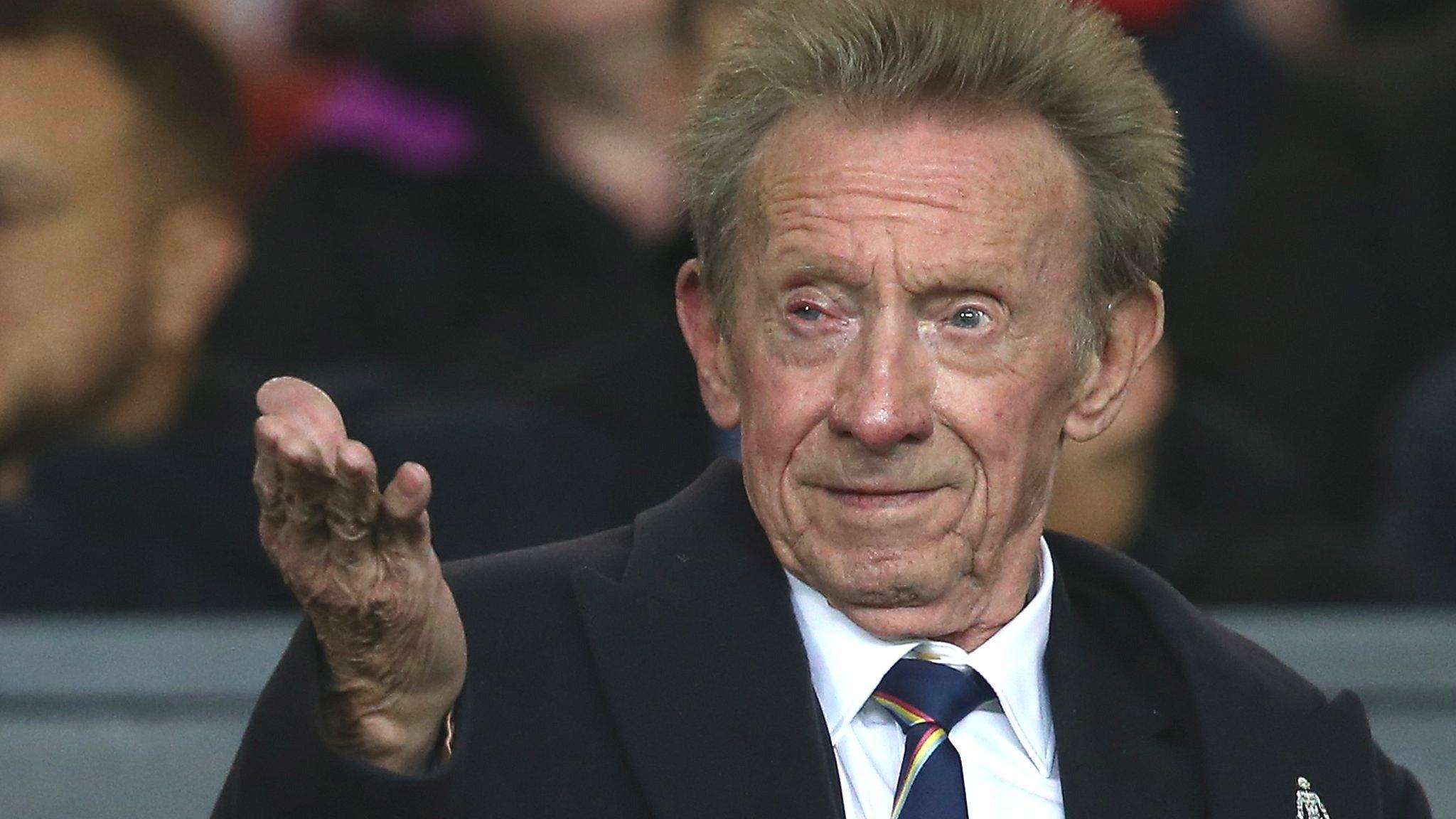 Denis Law watching Manchester United at Old Trafford