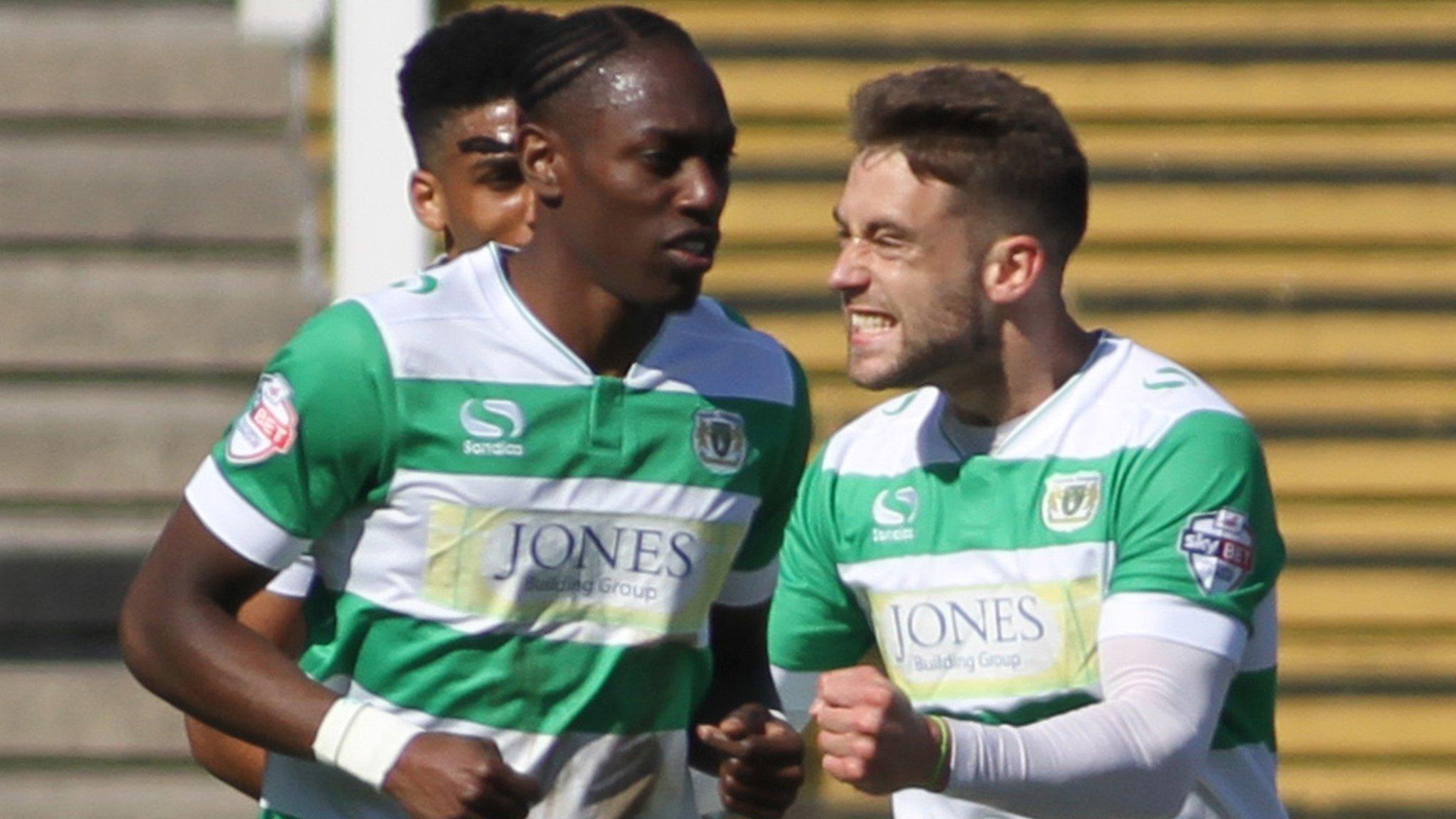 Jack Compton celebrates after scoring from the spot for Yeovil