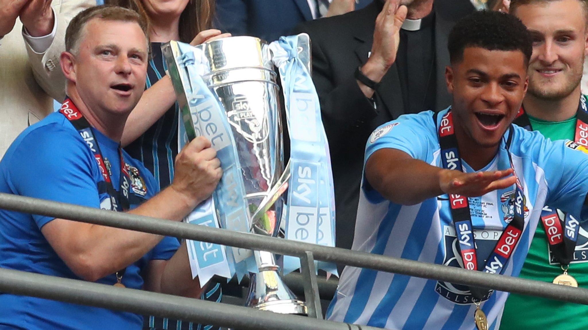 Mark Robins celebrates Coventry City's promotion from League Two