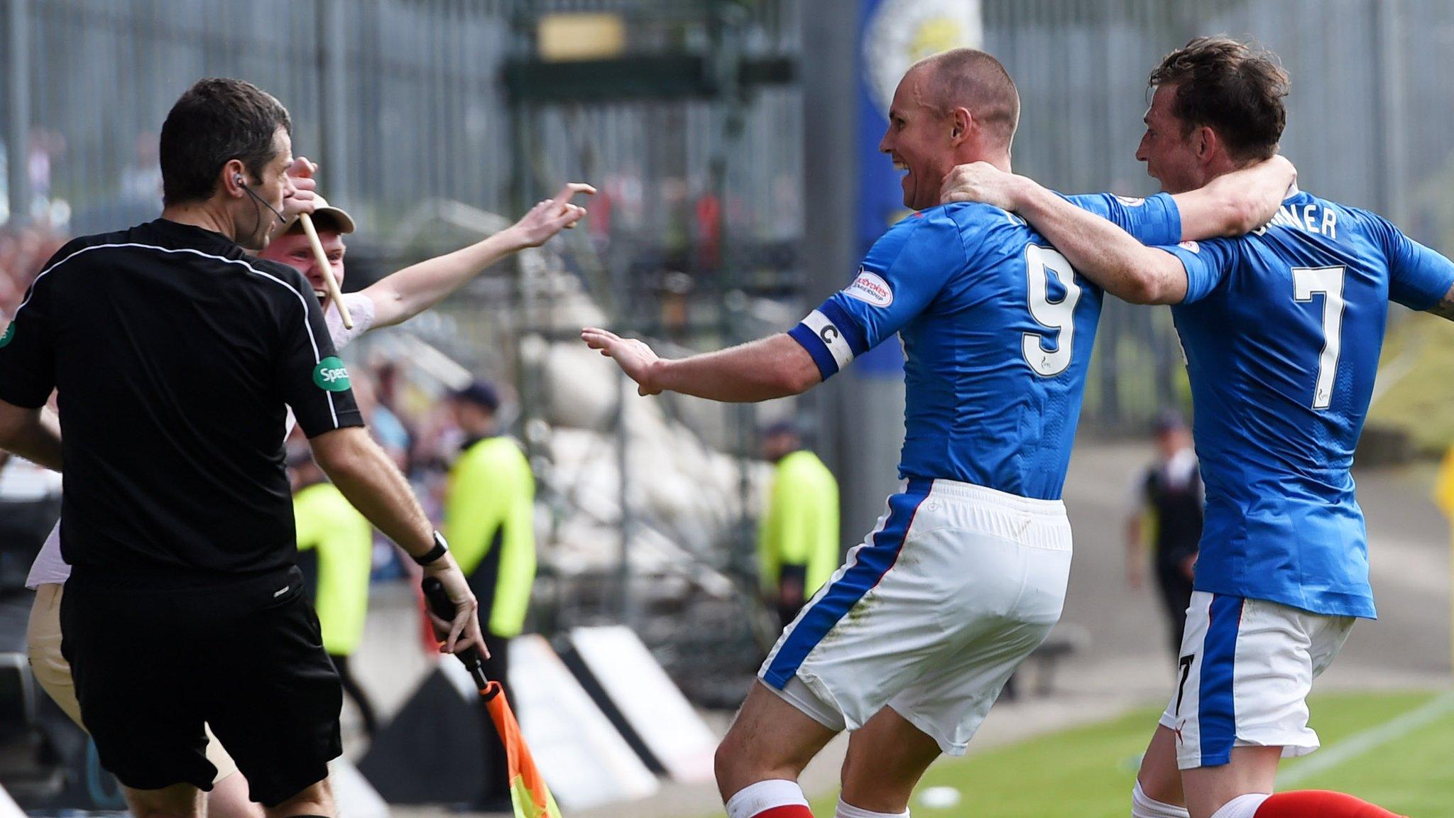 Kenny Miller and Joe Garner celebrate with the Rangers fans after the late winner