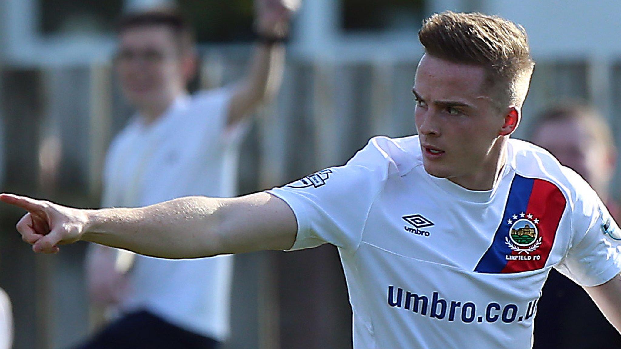 Aaron Burns celebrates scoring the equaliser