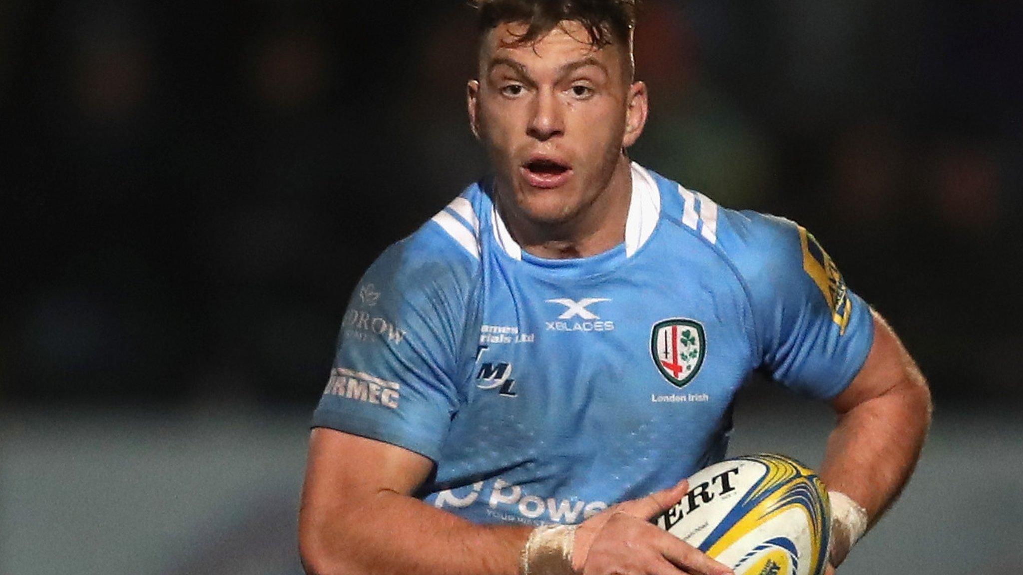 London Irish winger Alex Lewington carries the ball forward