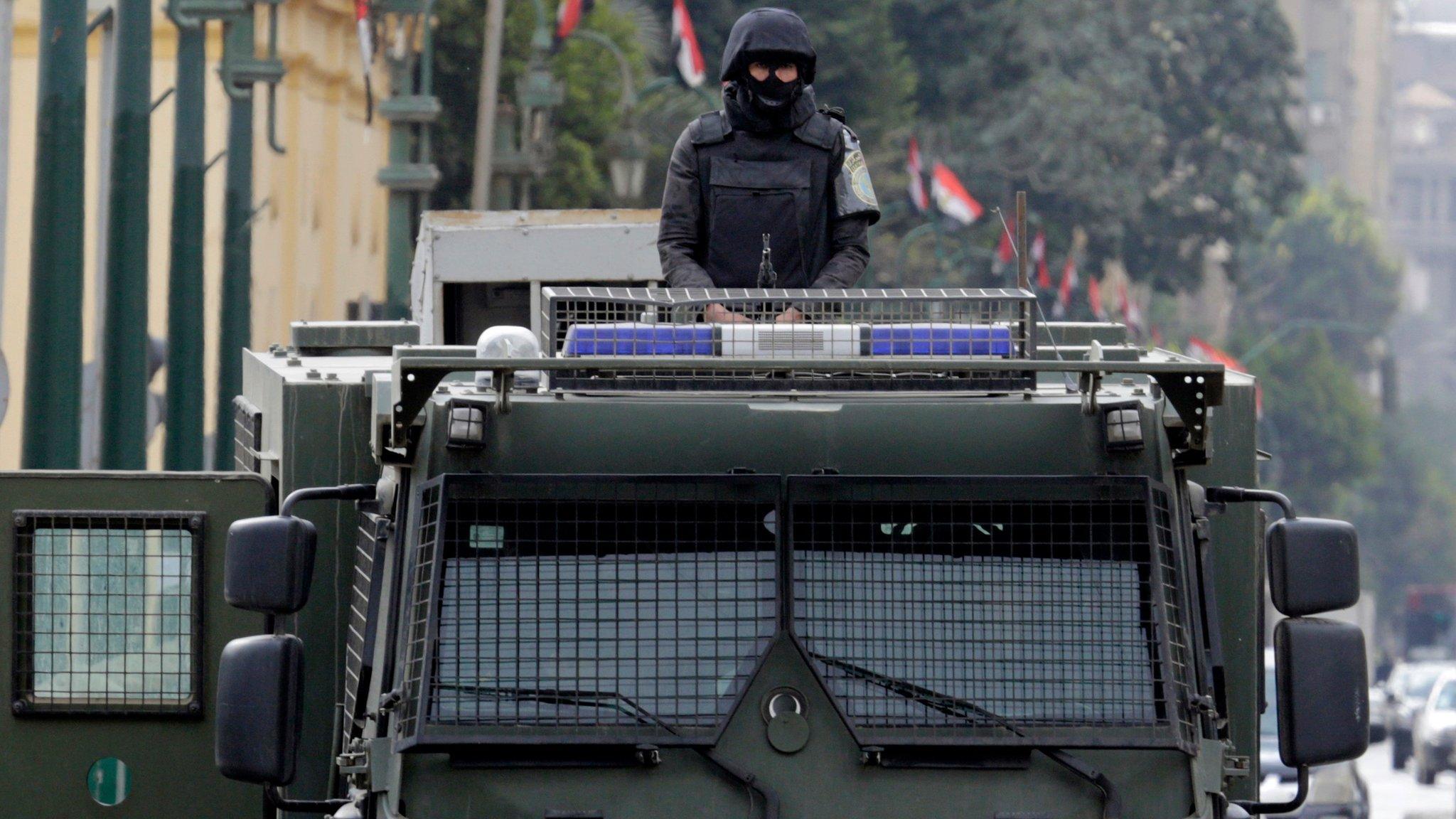 Egyptian police deployed in Cairo's Tahrir Square on 25 January 2016