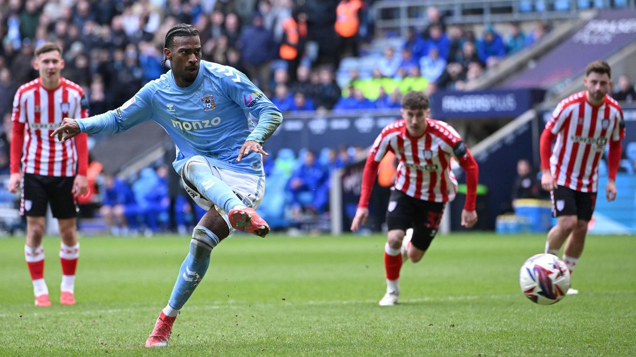 Coventry City's Haji Wright scores from the penalty spot on his way to a hat-trick against Sunderland in March