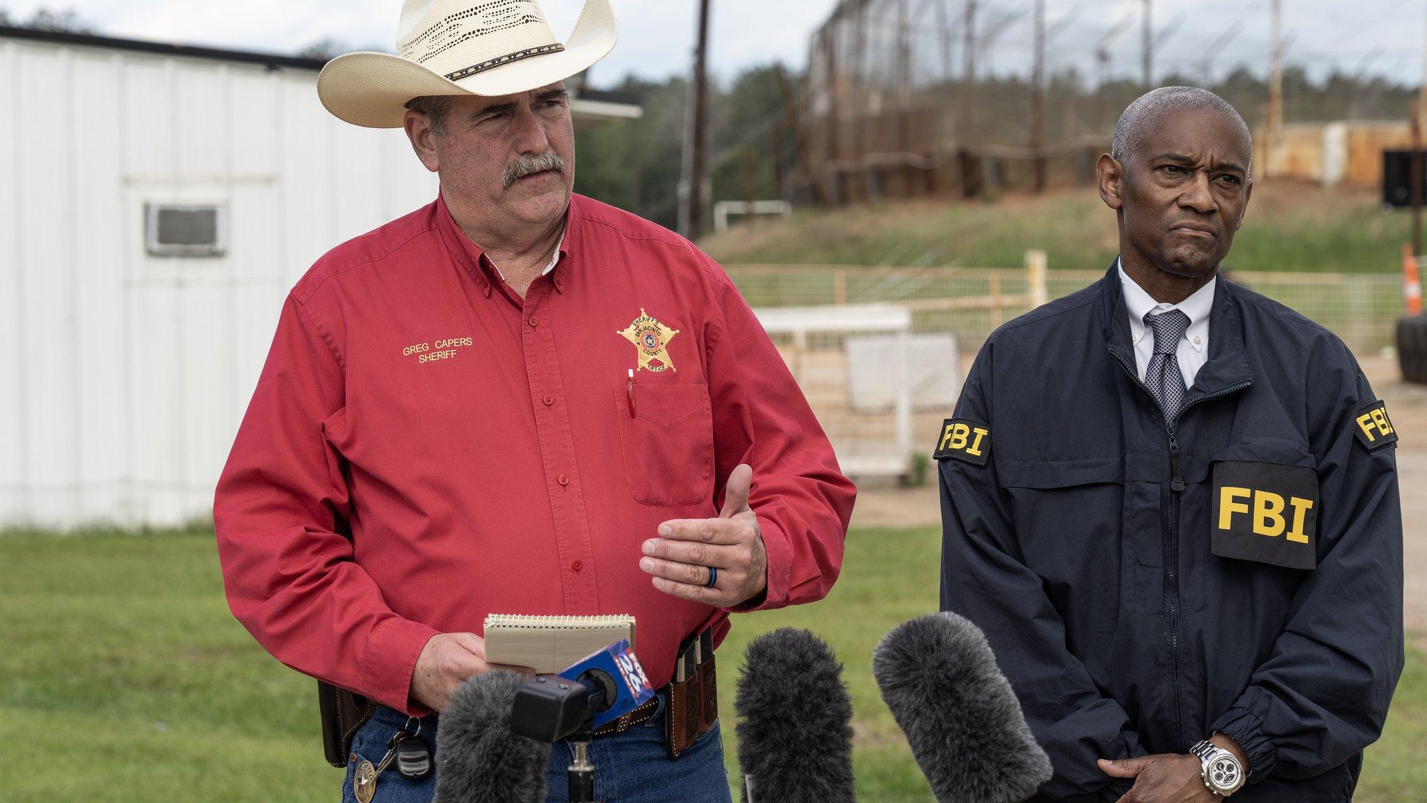 Officials speak at a press conference