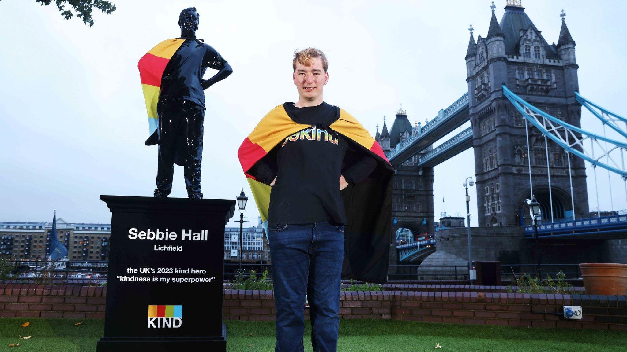 Sebbie Hall in the foreground in front of his statute with Tower Bridge in the background