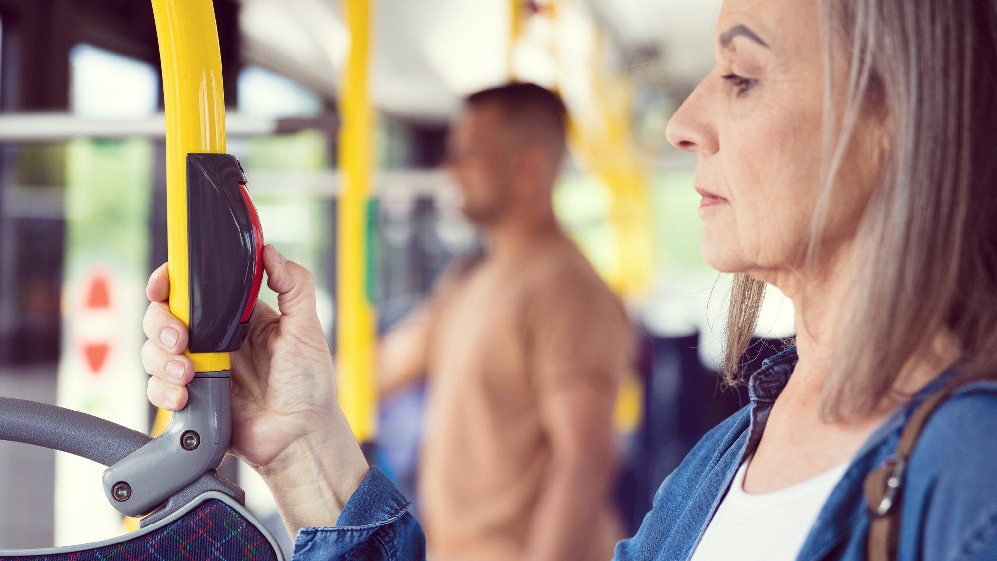 Woman travelling by bus - generic