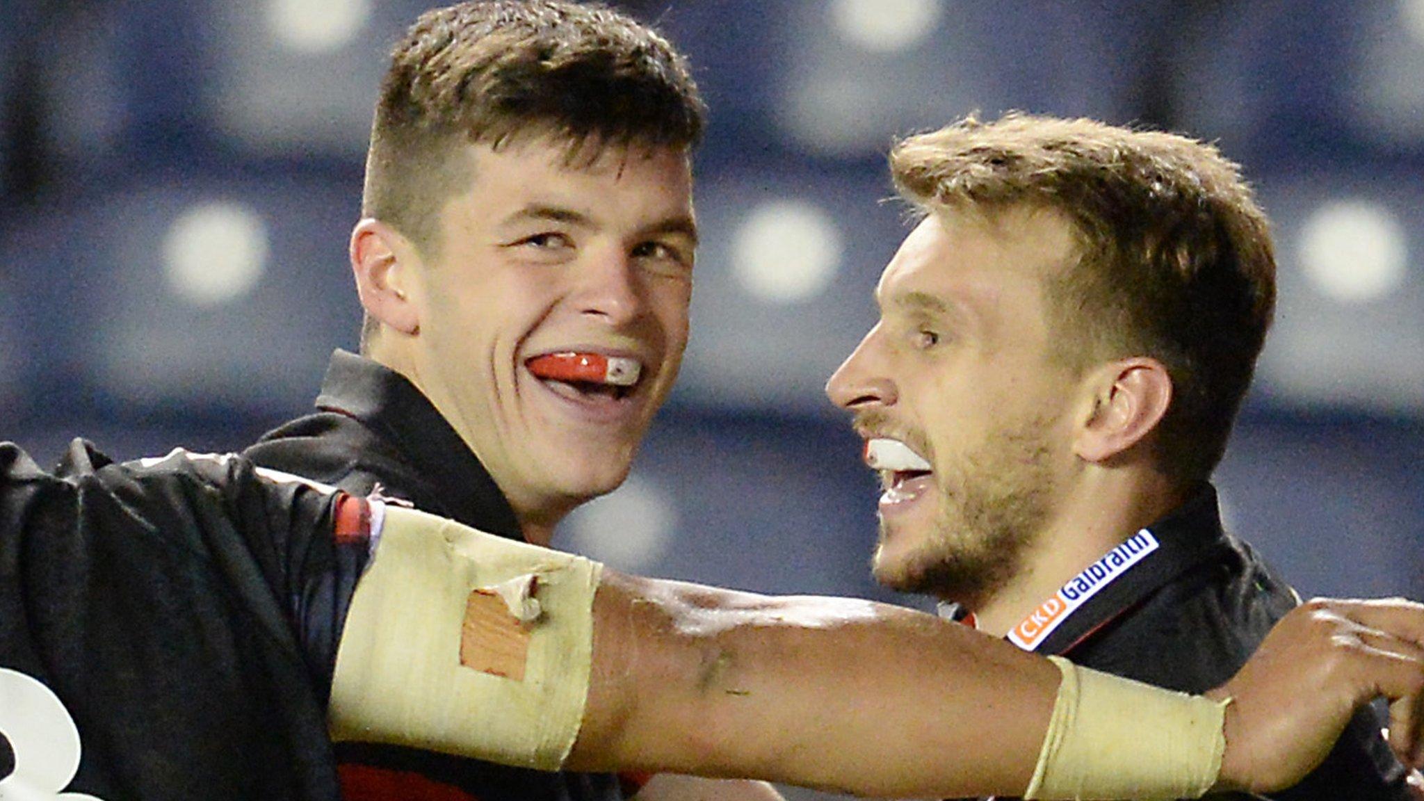 Blair Kinghorn helps Tom Brown celebrate one of his two tries