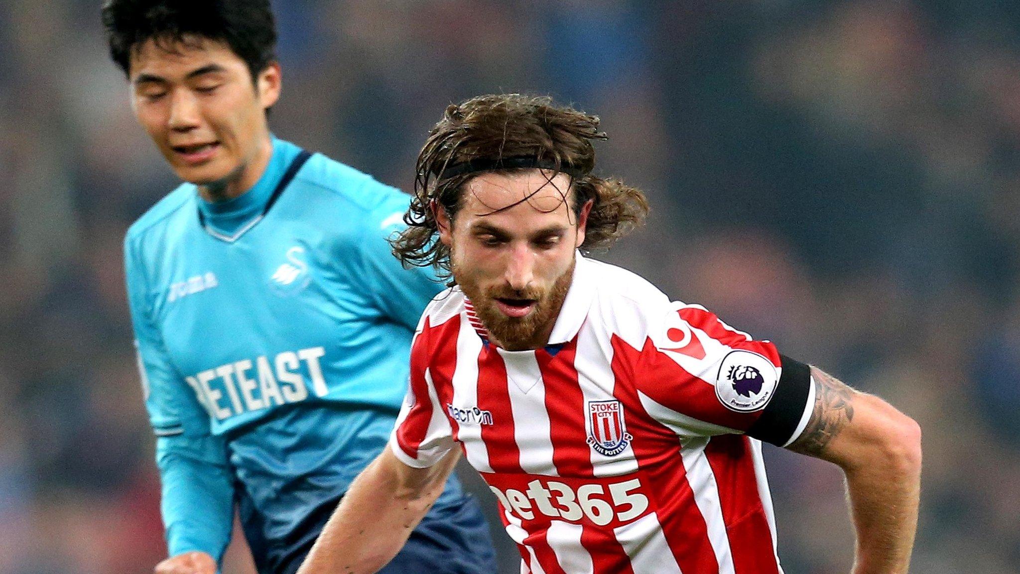 Joe Allen in action against Swansea City