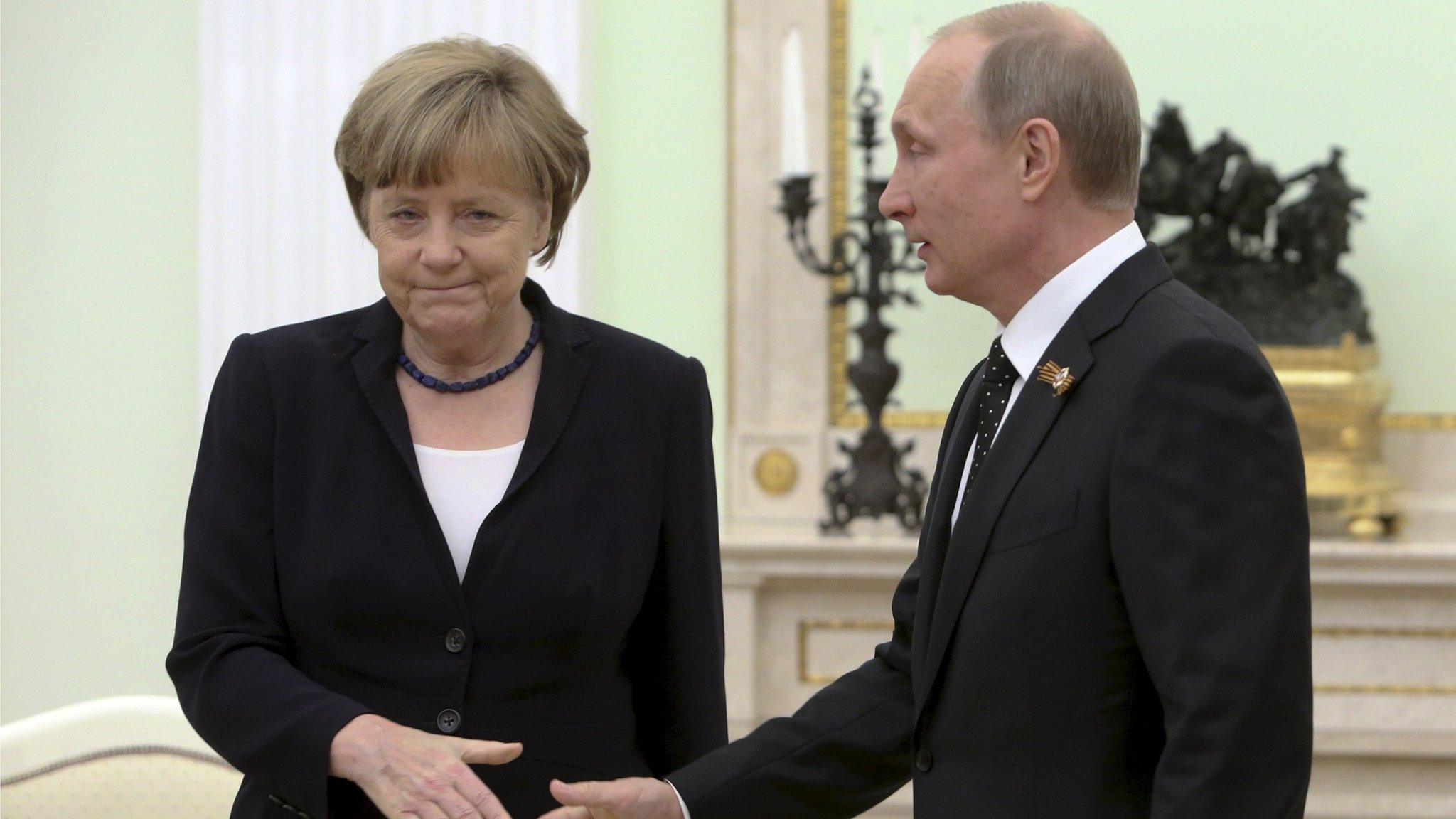 Angela Merkel and Vladimir Putin