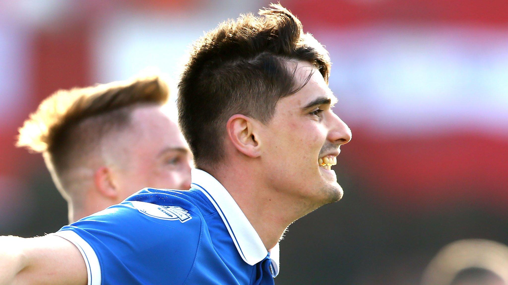 Jimmy Callacher celebrates after putting Linfield ahead at Solitude