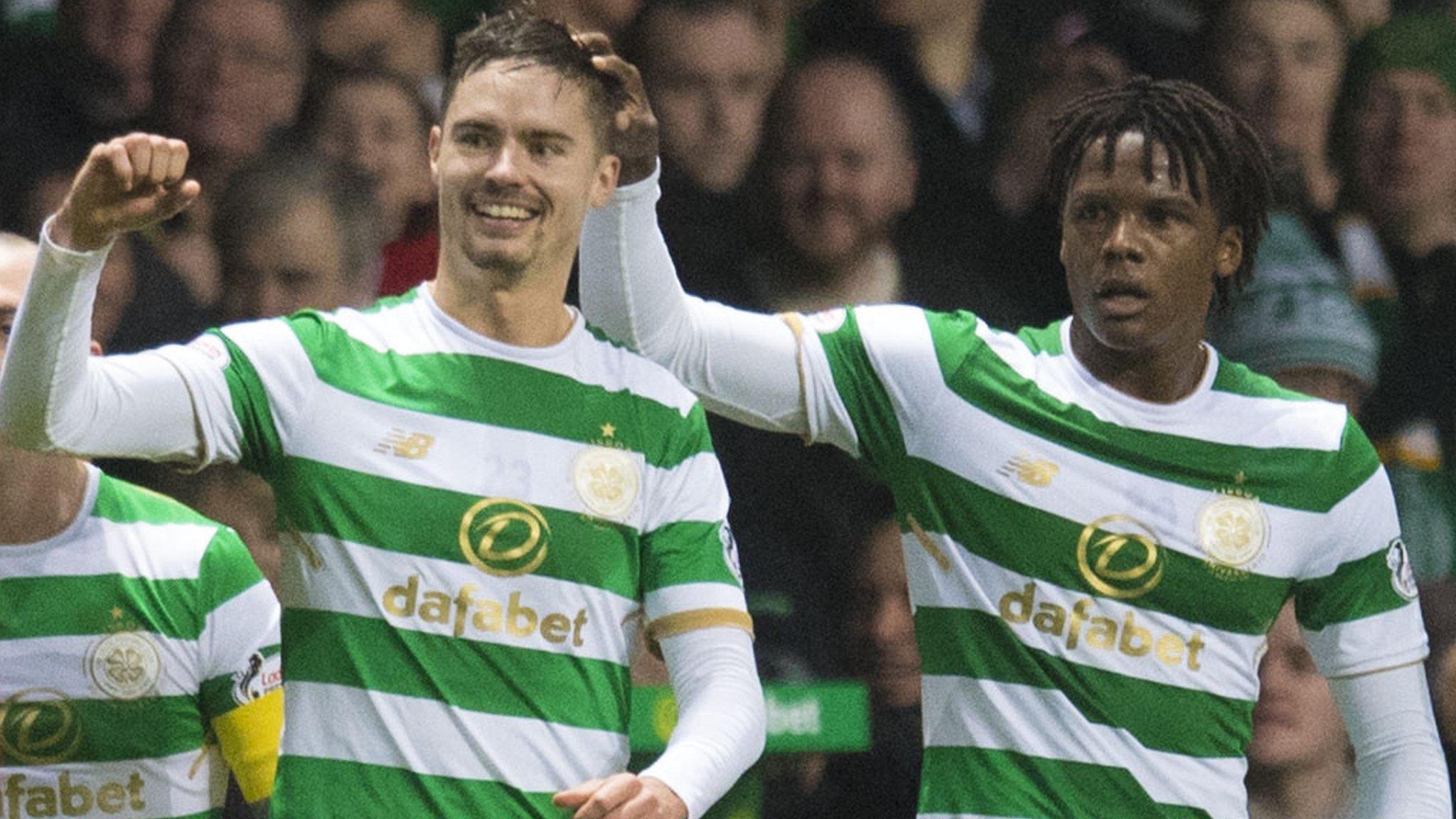 Mikale Lustig and Dedryck Boyata celebrate the former's goal at Celtic Park