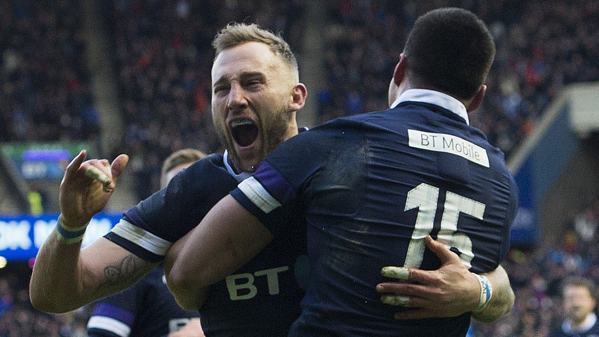 Byron McGuigan and Sean Maitland celebrate the former's try for Scotland against Australia