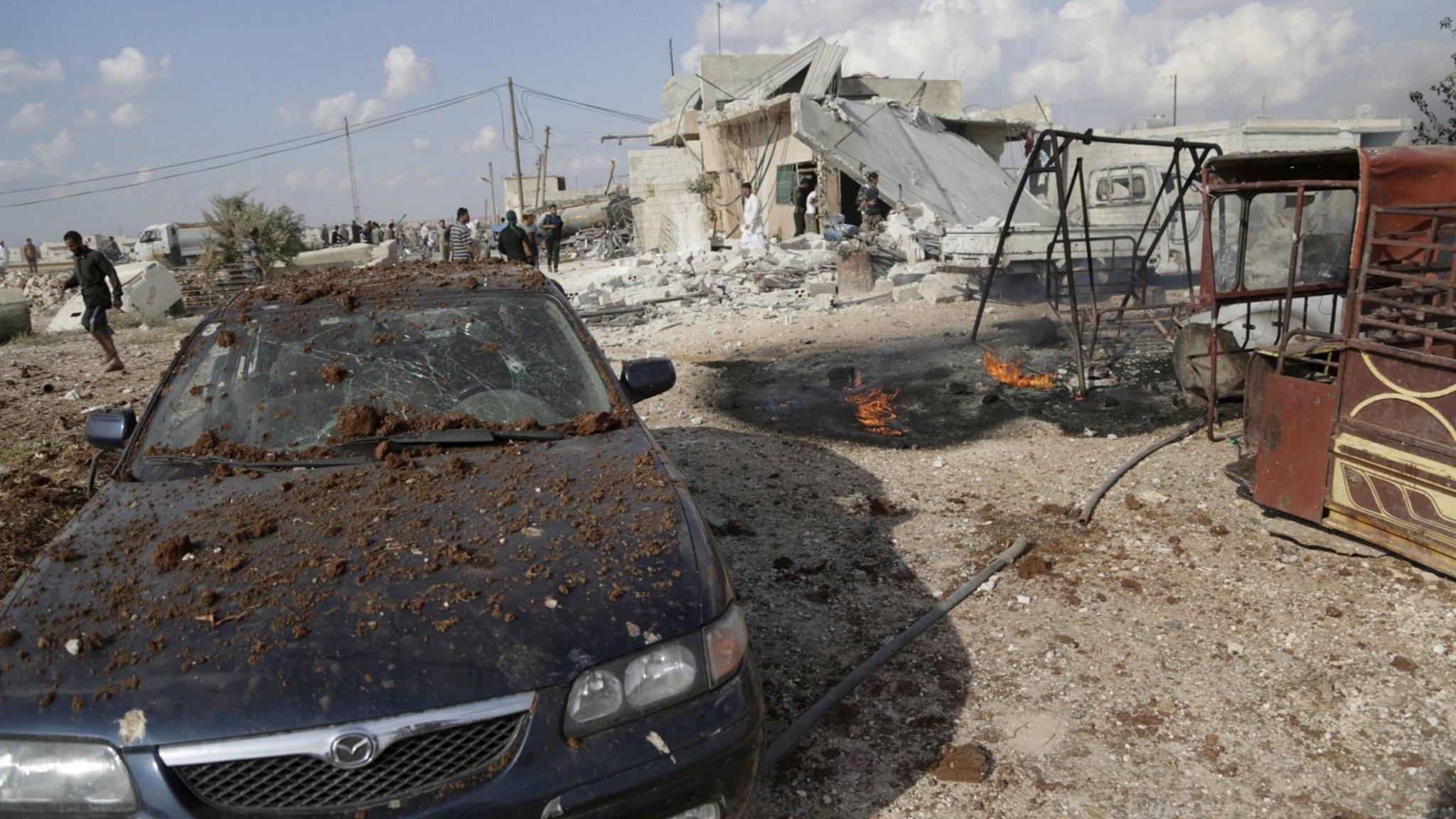 Aftermath of air attack by Russian jets in Maasran town, southern Idlib, 7 October.