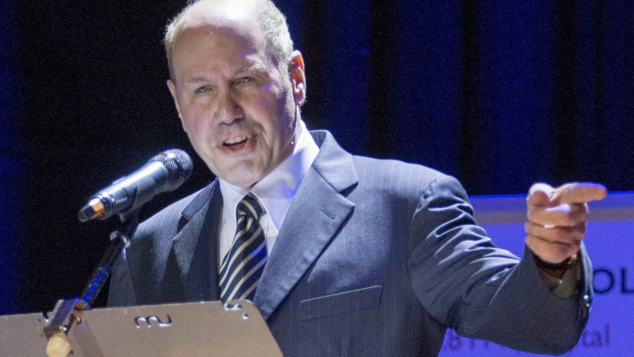 Michael Eisner addresses a meeting of Portsmouth FC shareholders at Portsmouth Guildhall