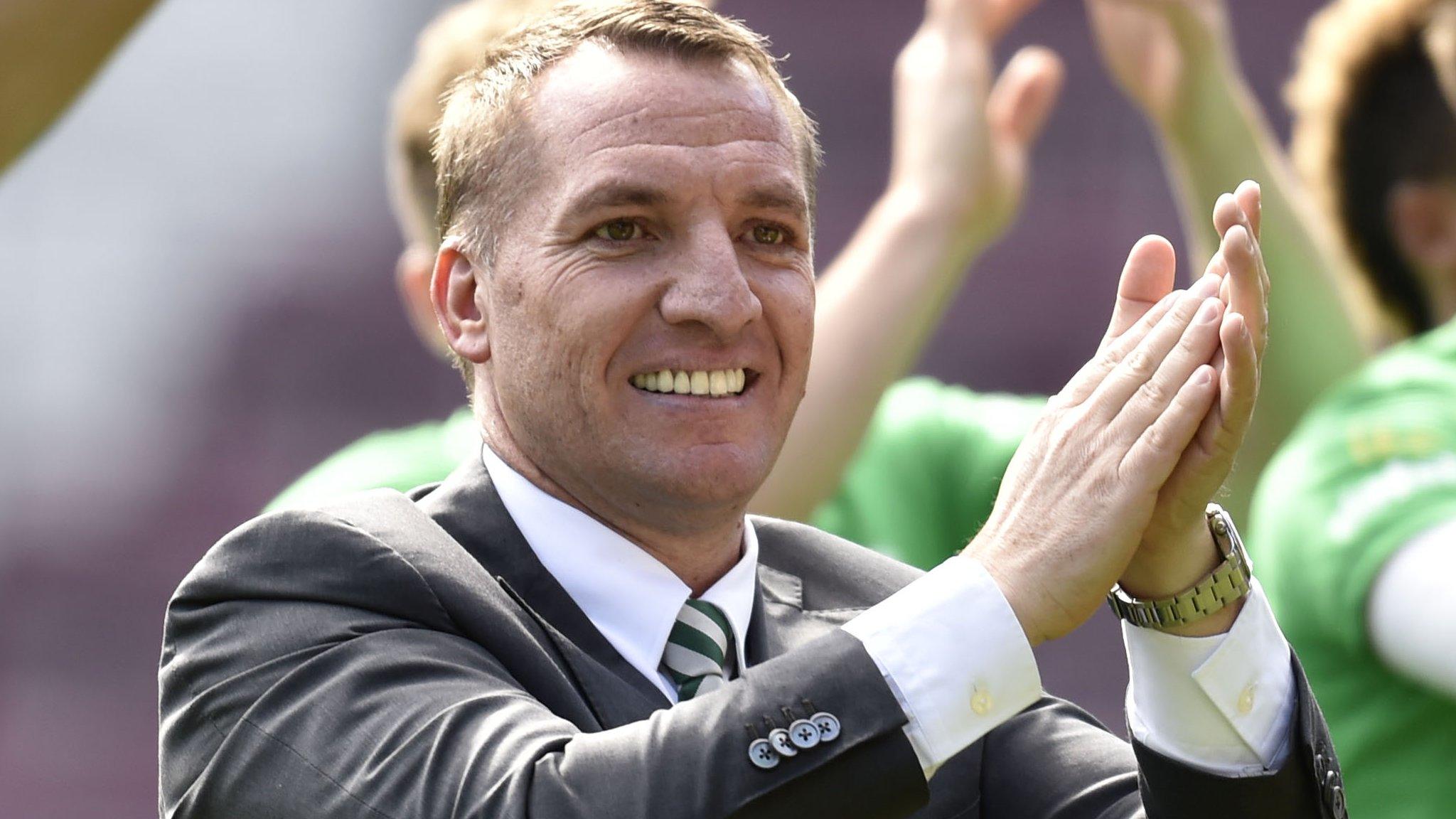 Celtic manager Brendan Rodgers applauds visiting fans at Tynecastle