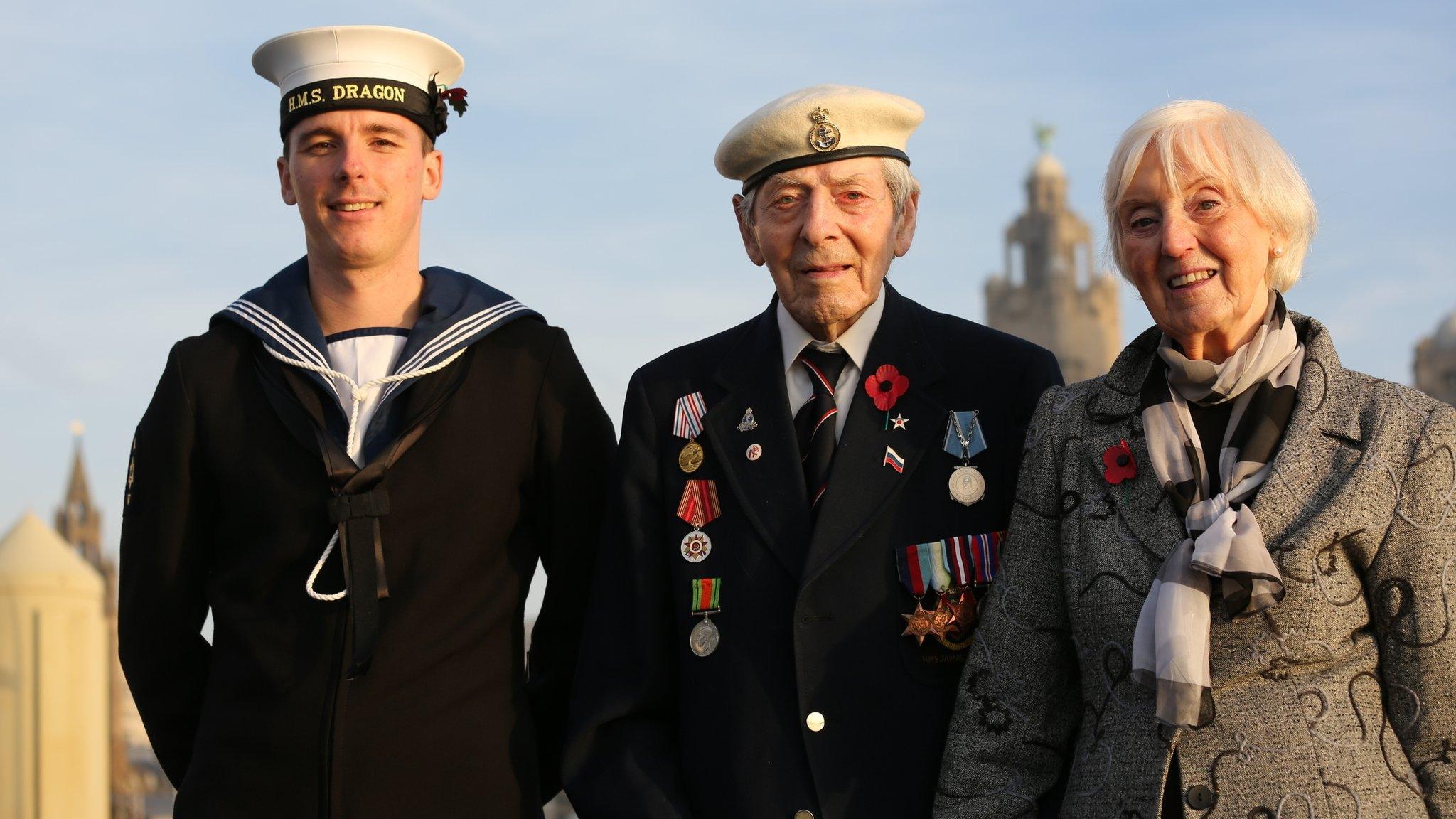 Veteran Jim Simpson with his wife Sybil and Scots sailor Lee Campbell, who serves on HMS Dragon