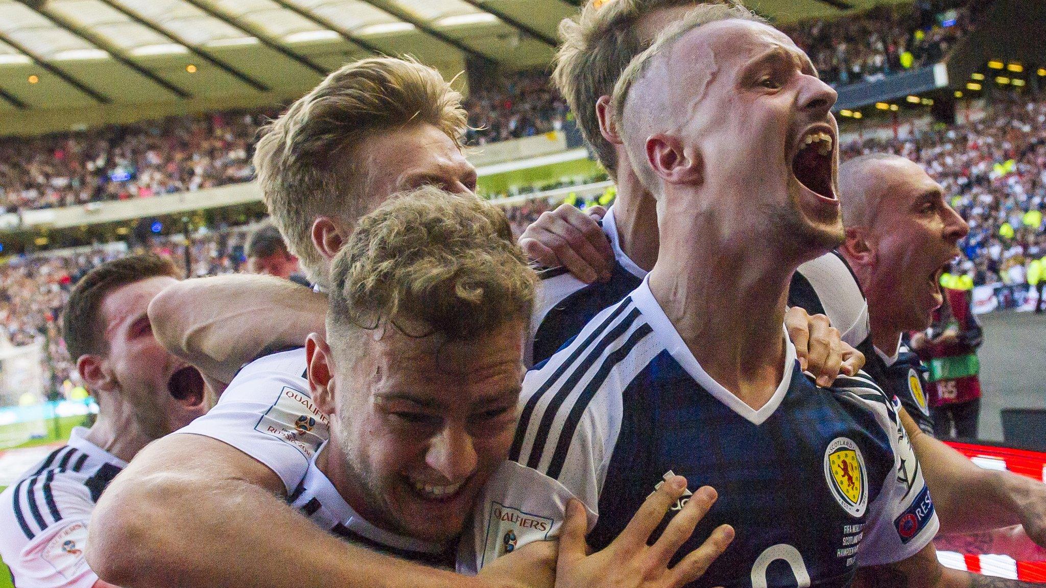 Scotland celebrate a Leigh Griffiths goal against England in their World Cup qualifier in June 2017