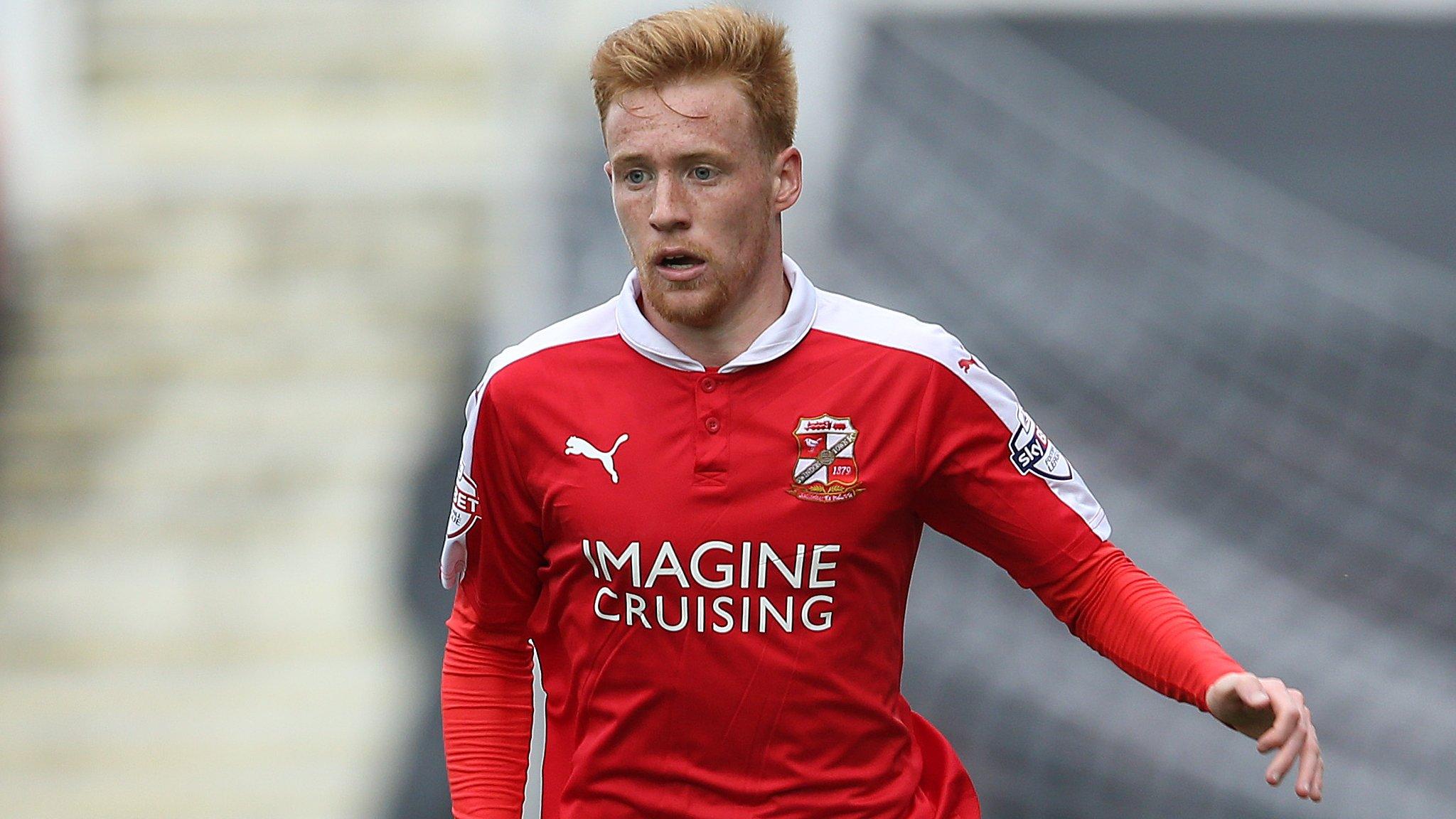 Swindon Town midfielder James Brophy