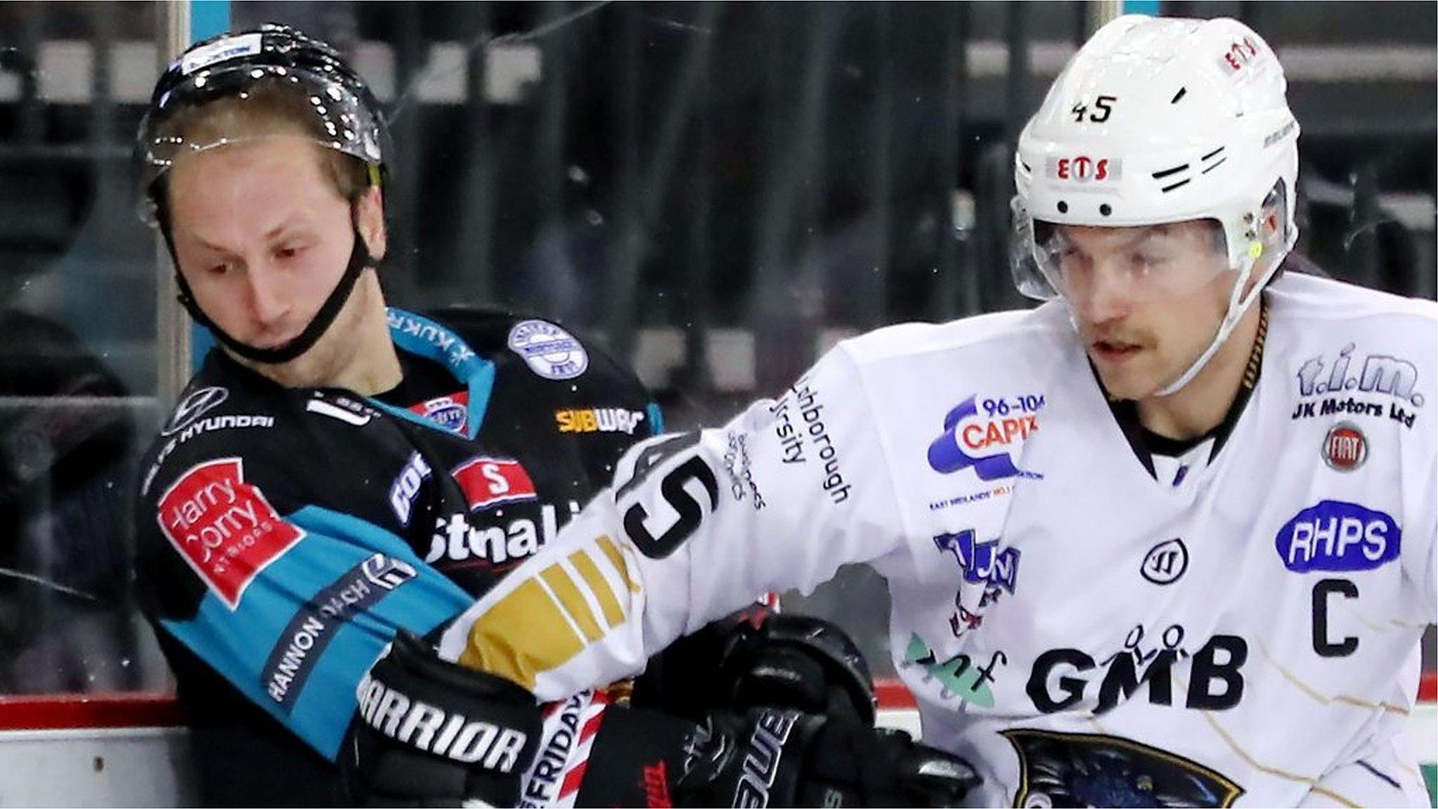 Belfast Giants' Dustin Johner battles with Nottingham's Steve Lee in Wednesday's game