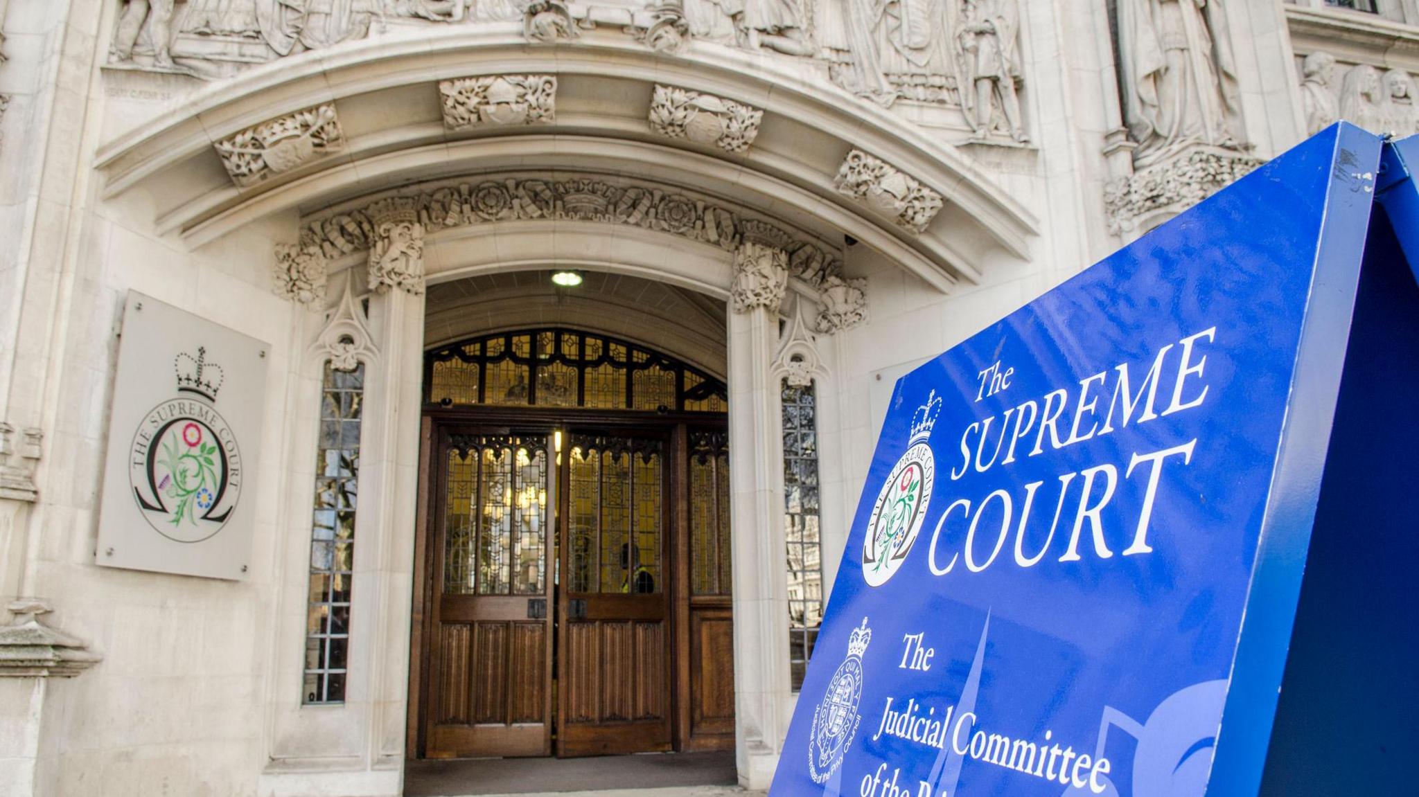 The arched stone entrance to the Supreme Court 