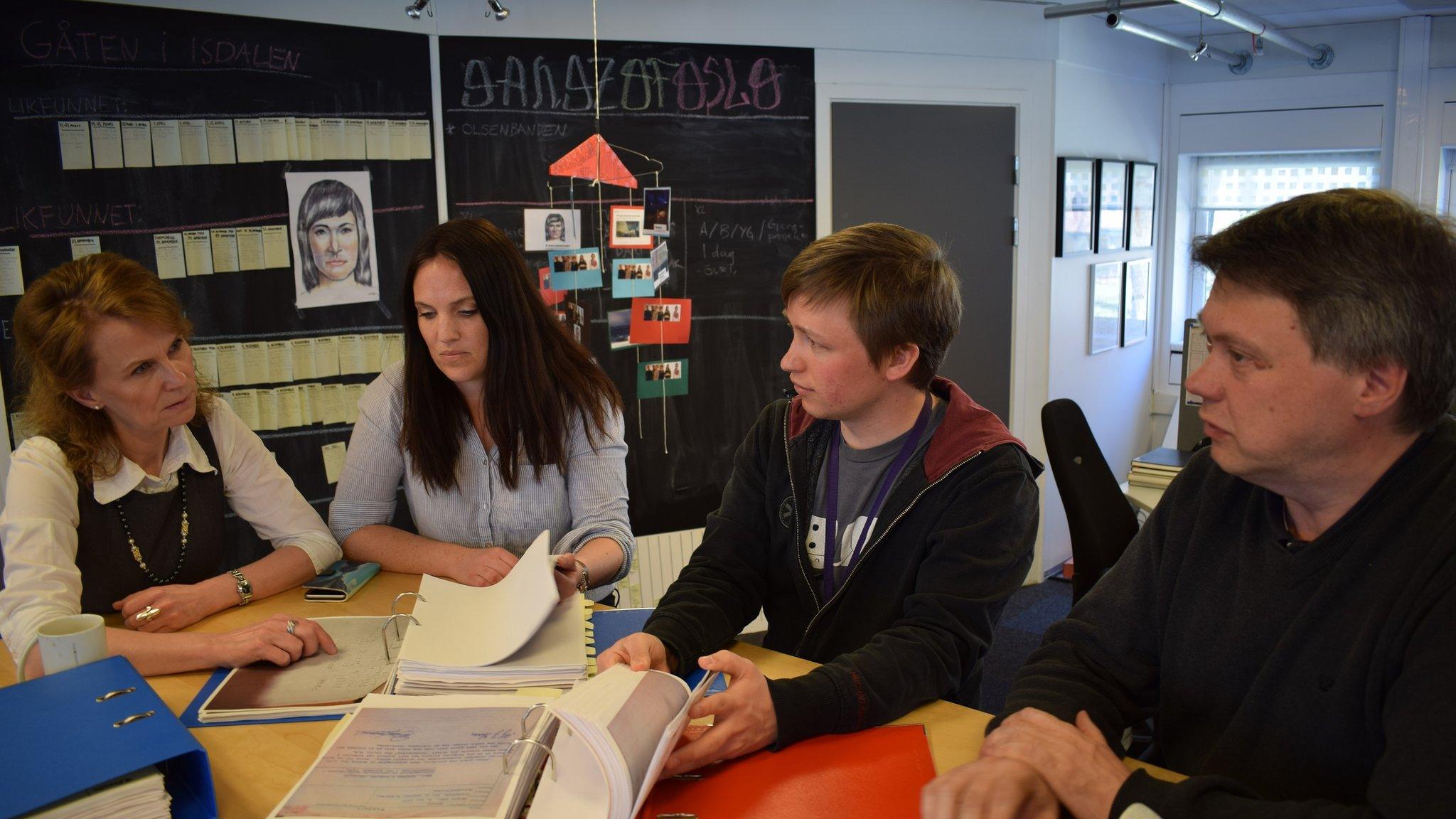 NRK investigative journalists (from left to right): Marit Higraff, Eirin Aardal, Øyvind Bye Skille and Ståle Hansen in front of a blackboard outlining key dates in the Isdal Woman investigation