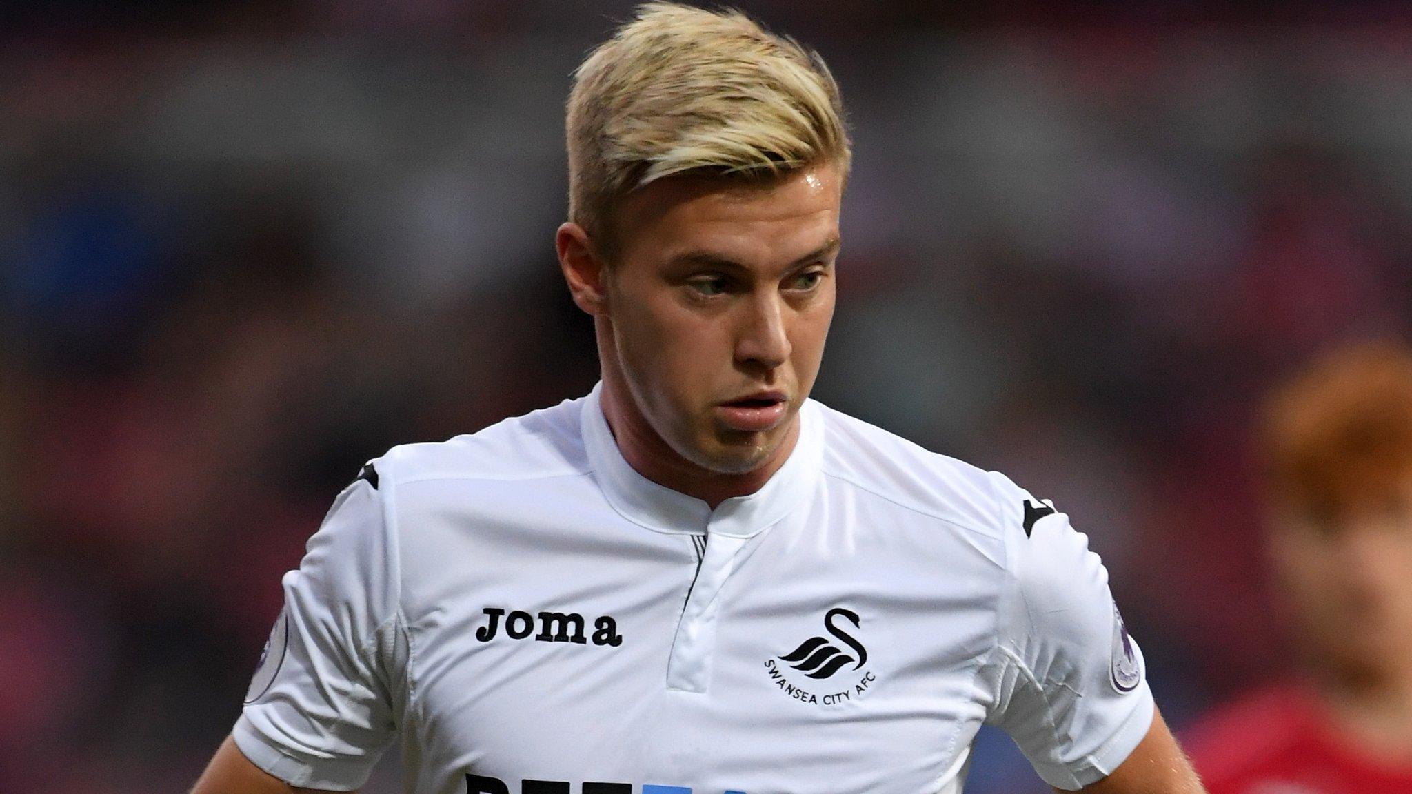 Adam King playing for Swansea City