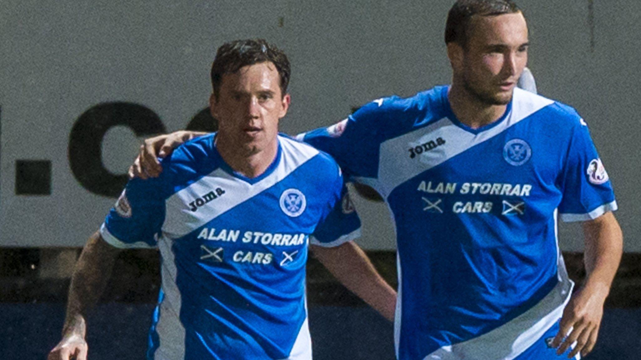 Danny Swanson (left) receives the congratulations after his penalty equaliser