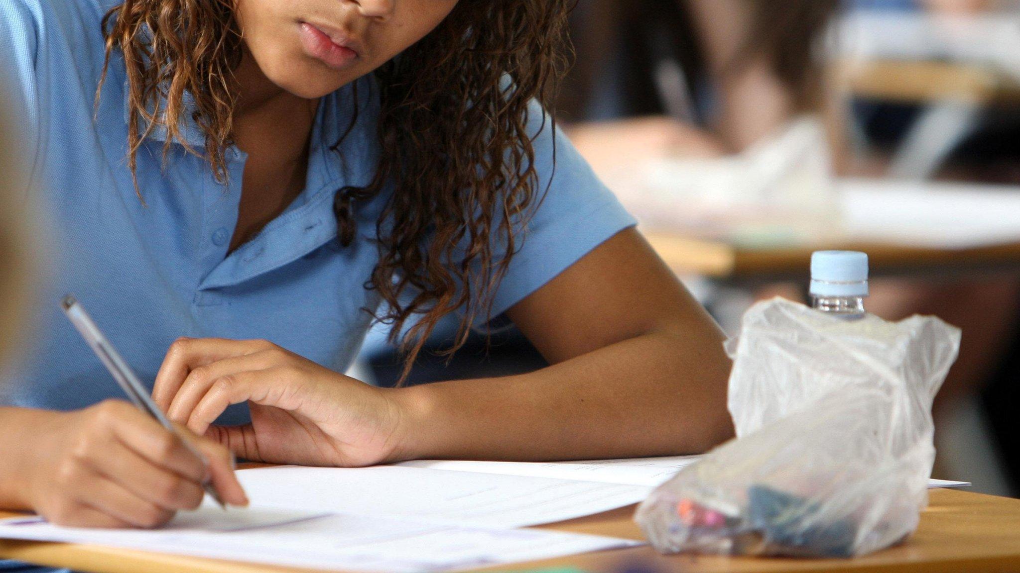 Girl taking school exam