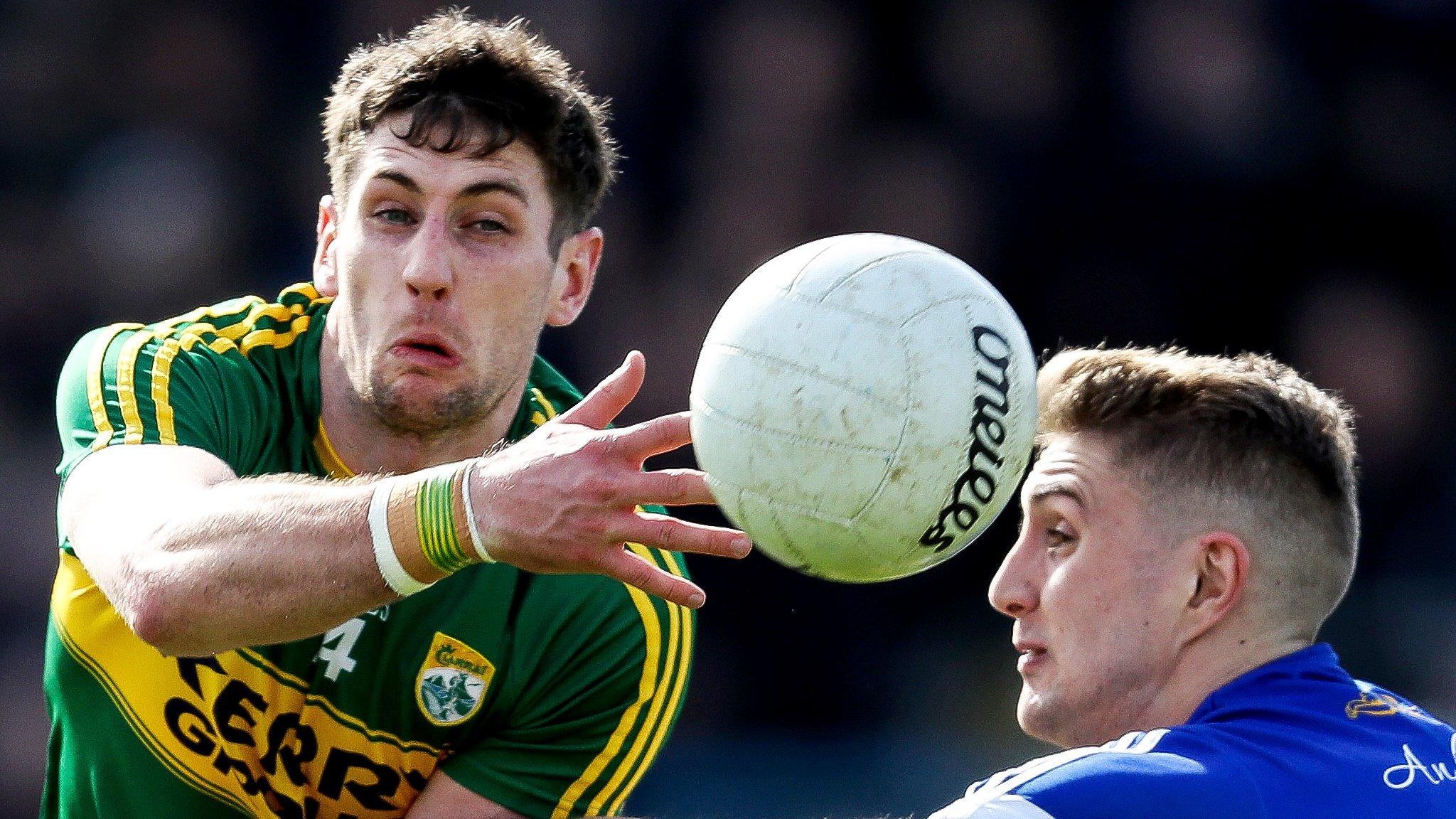 Cavan's Killian Clarke battles with Kerry's Paul Geaney