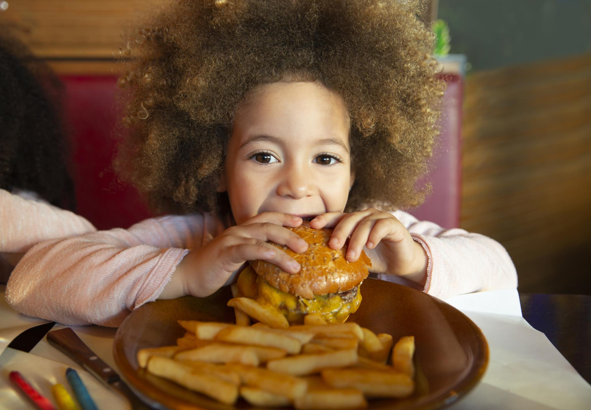 Child eating burger