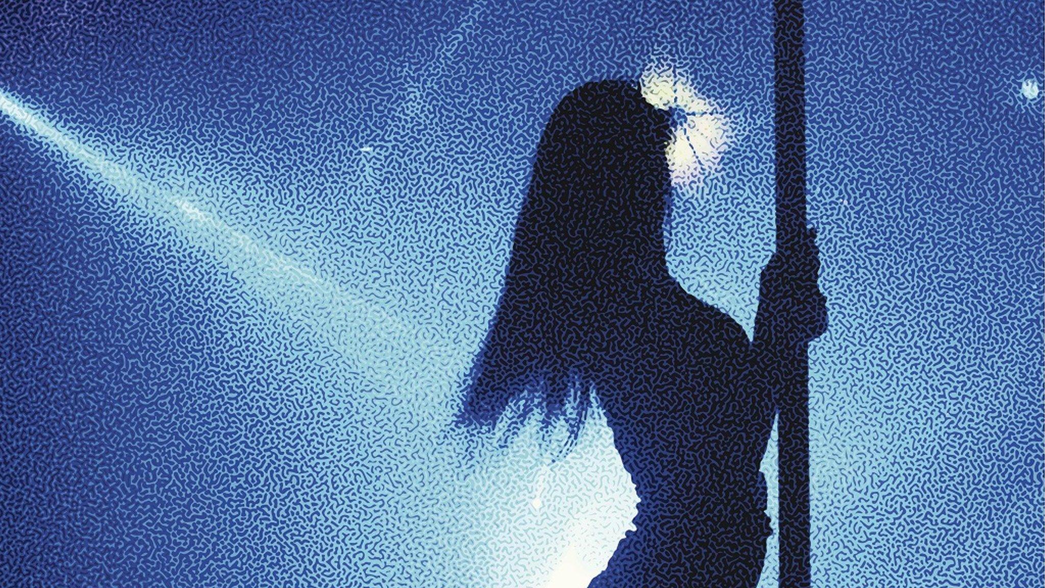 Silhouette of pole dancer