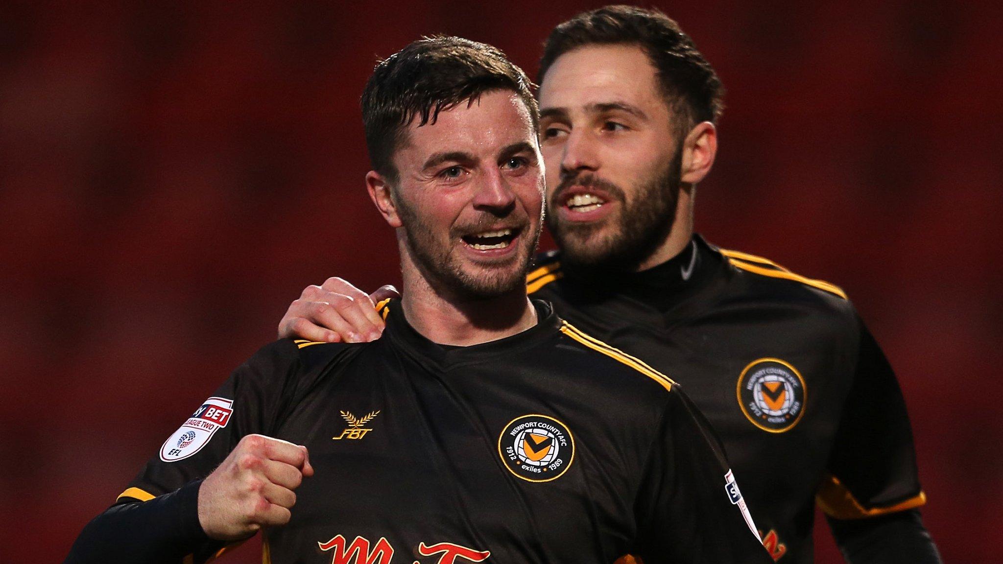 Padraig Amond celebrates his goal for Newport against Cheltenham