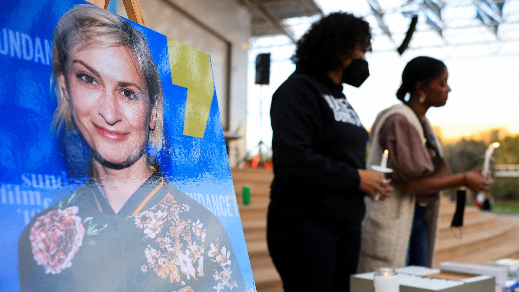 A photo of Halyna Hutchins at a vigil in October