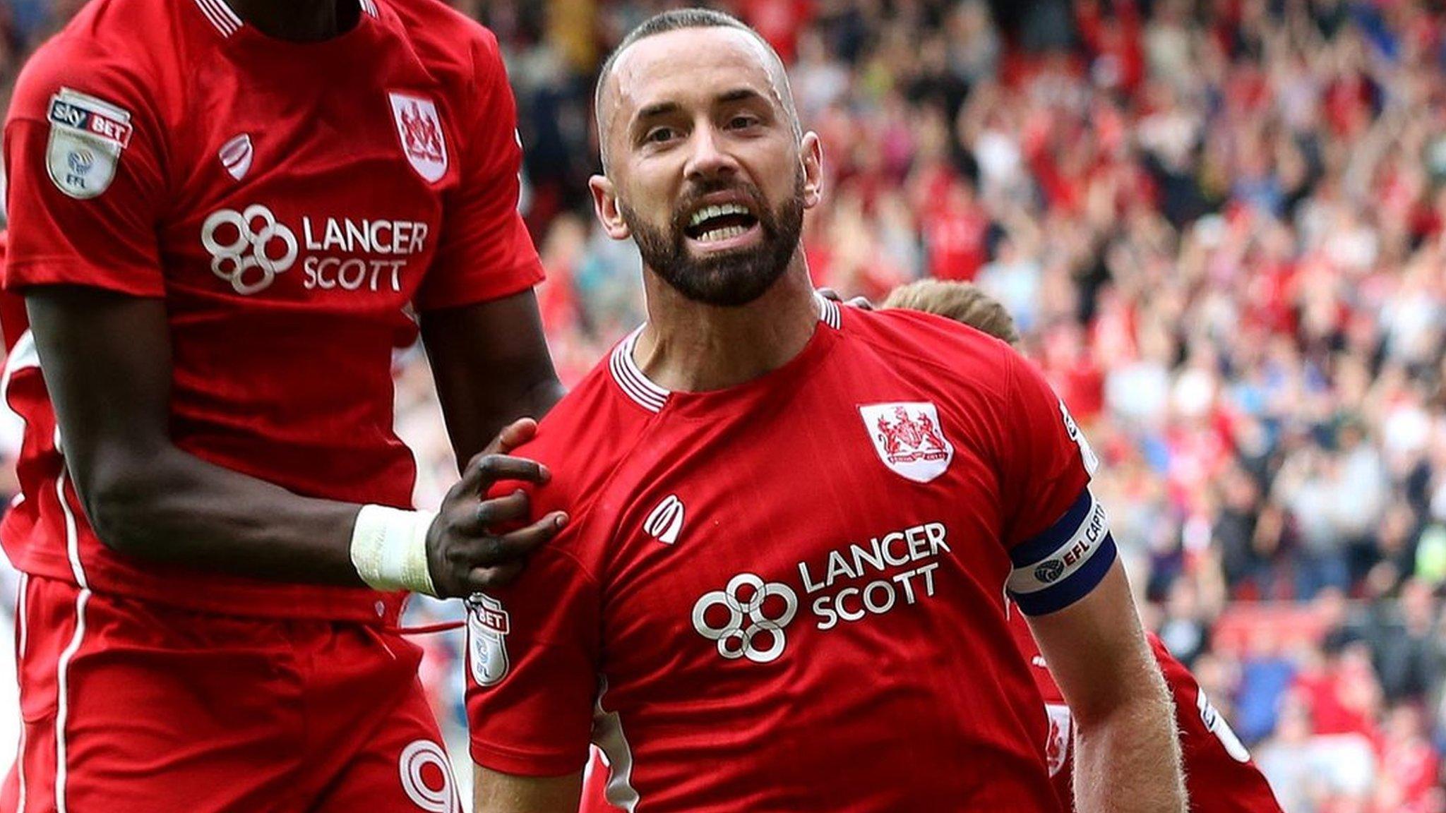 Aaron Wilbraham and Tammy Abraham celebrate Bristol City's late equaliser against Derby County