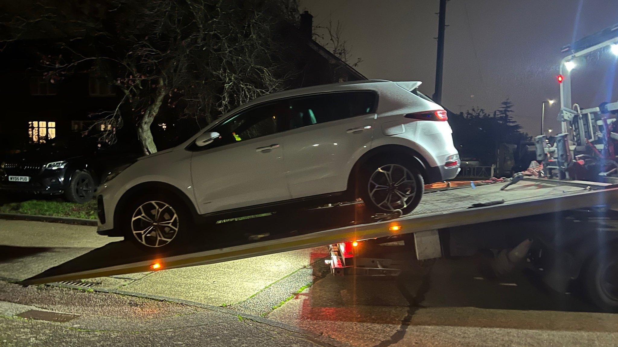 Car being towed away