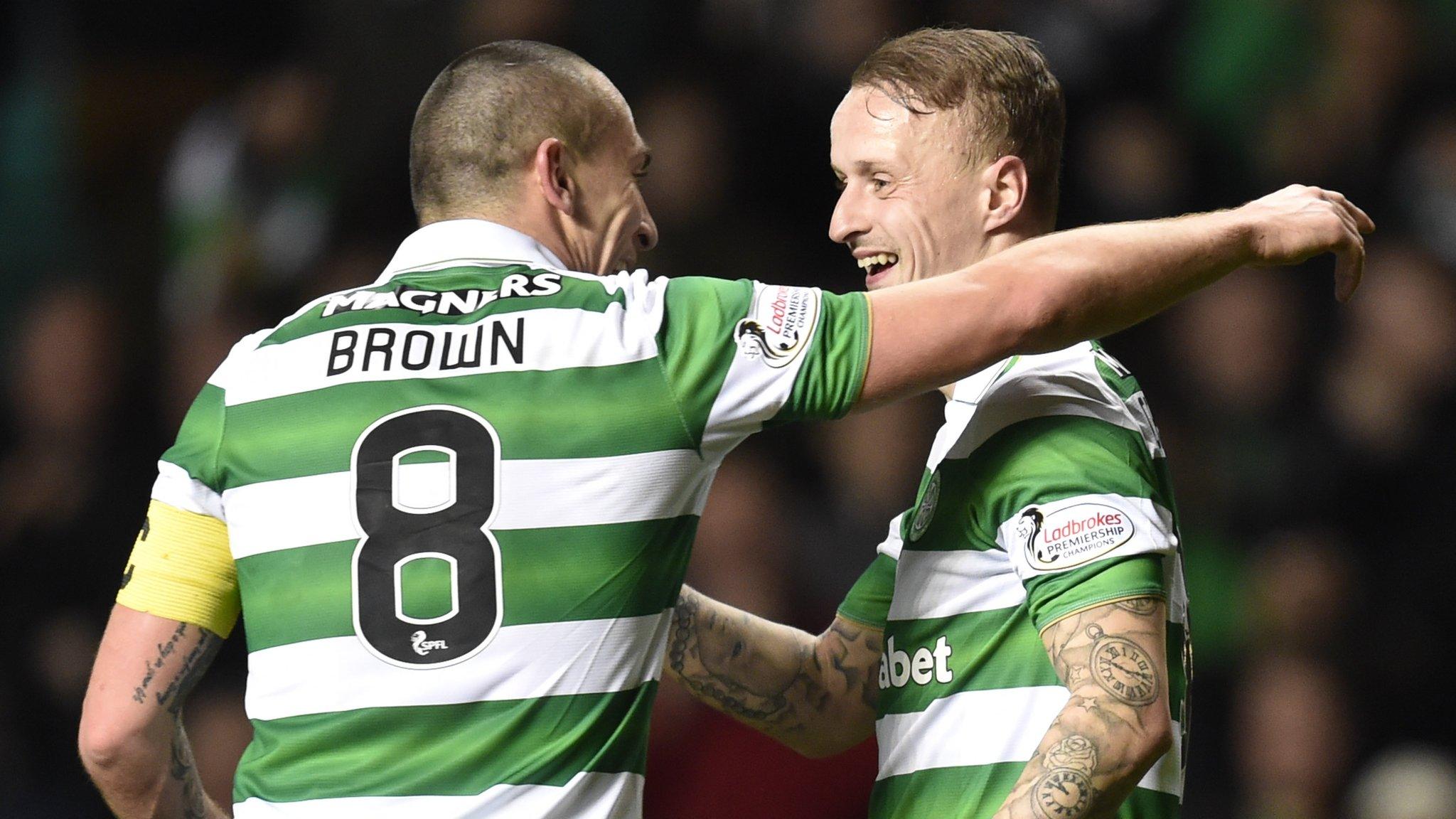 Scott Brown celebrates Celtic's goal with scorer Leigh Griffiths