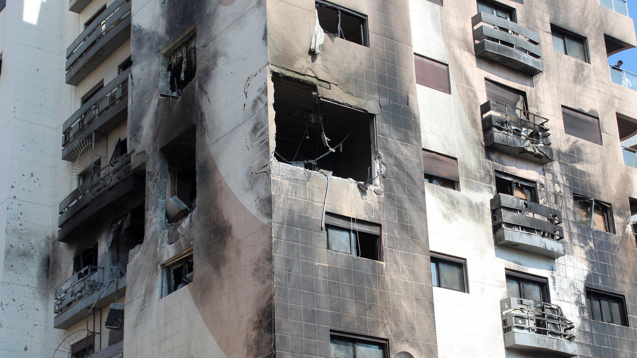 Damaged residential building in Kafr Sousa, Damascus, after what Syrian authorities said was an Israeli missile strike (21 February 2024)