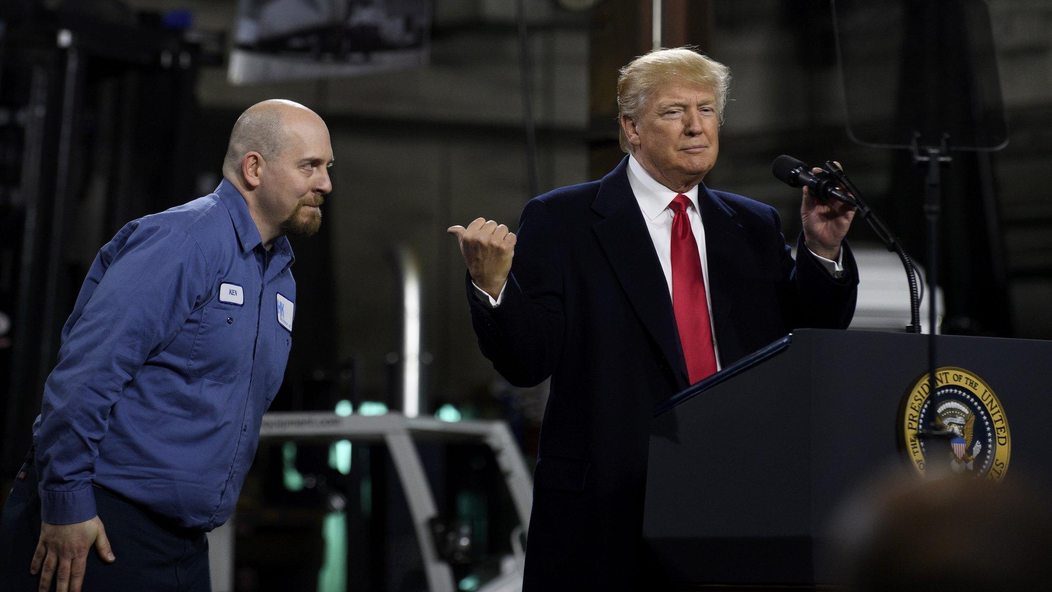 President Donald Trump introduces Ken Wilson, an employee of H&K Equipment, to supporters at a rally at H&K Equipment, a rental and sales company for specialized material handling solutions on January 18, 2018 in Coraopolis, Pennsylvania