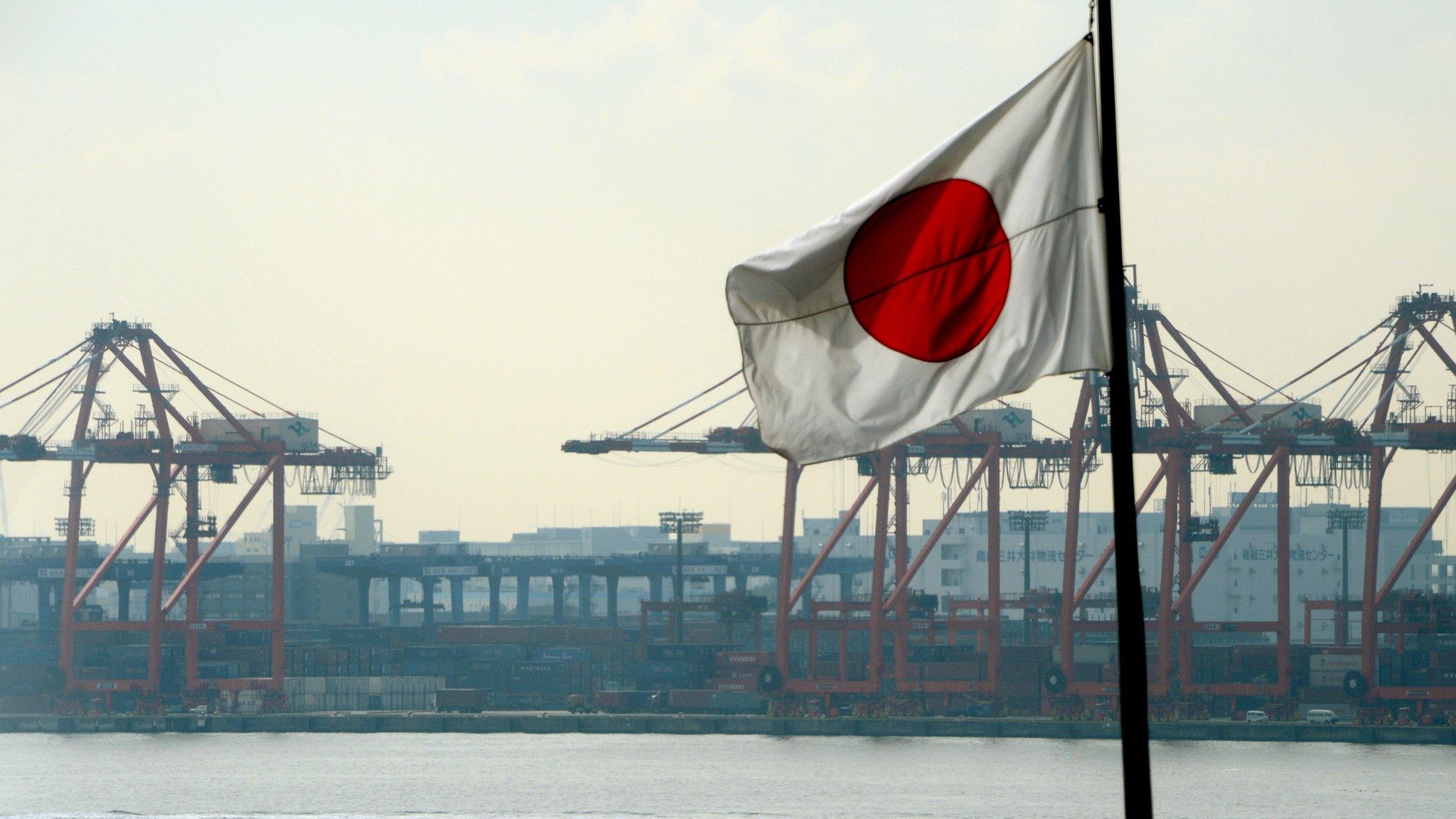 Japanese flag at container terminal