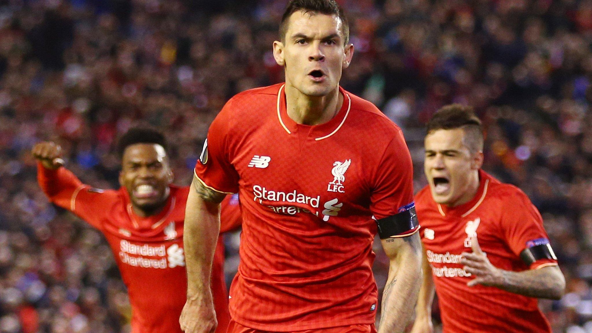 Dejan Lovren celebrates scoring the winning goal