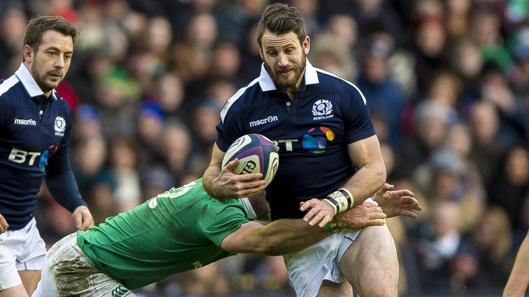 Robbie Henshaw tackles Tommy Seymour