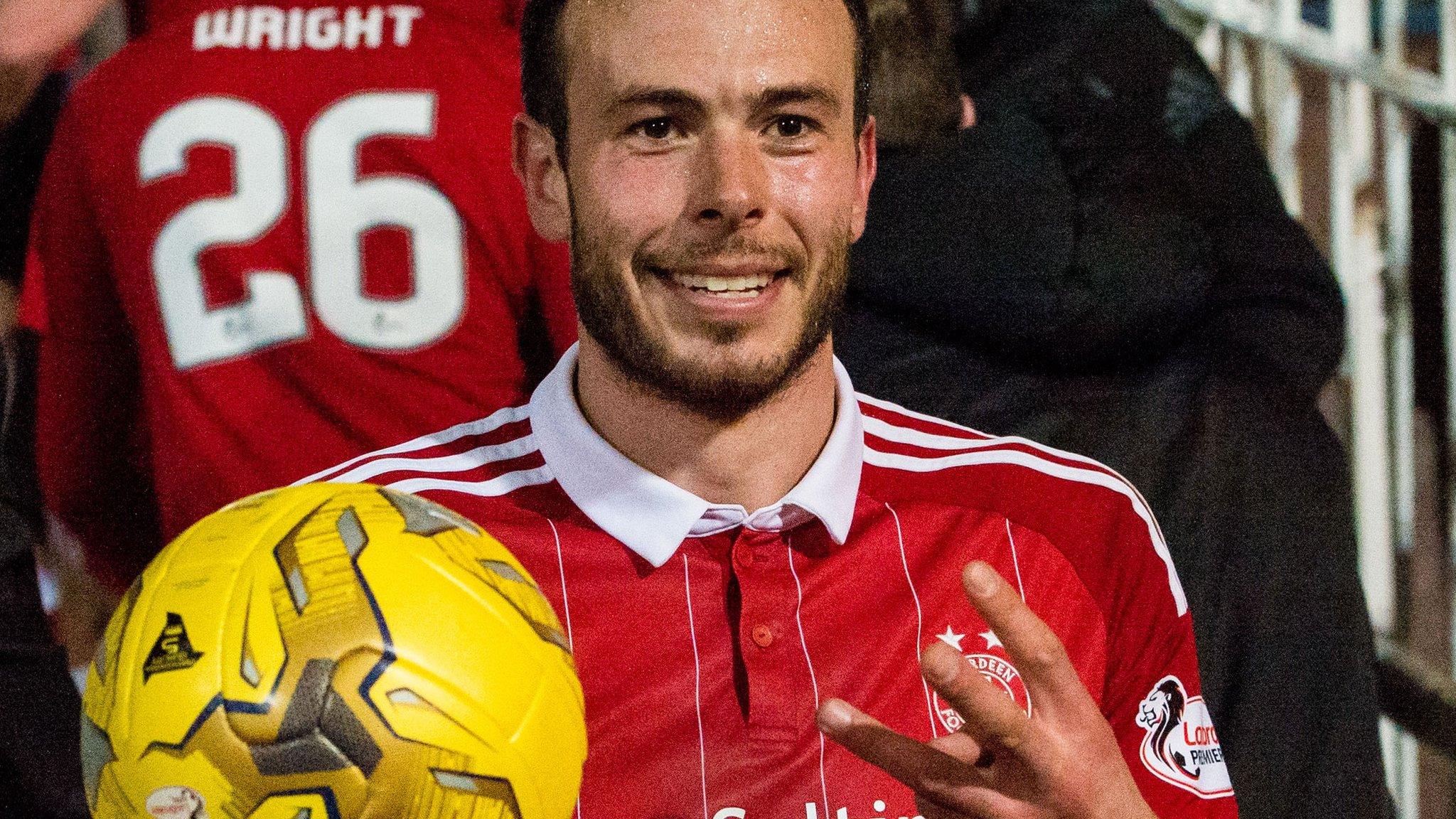 Andrew Considine with the match ball