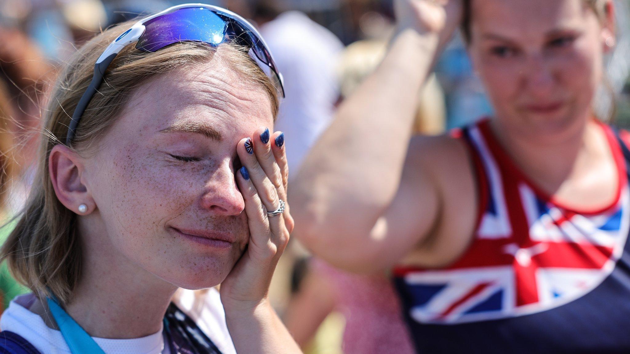 Erin Kennedy wipes away tears after winning gold at the European Rowing Championships in 2022