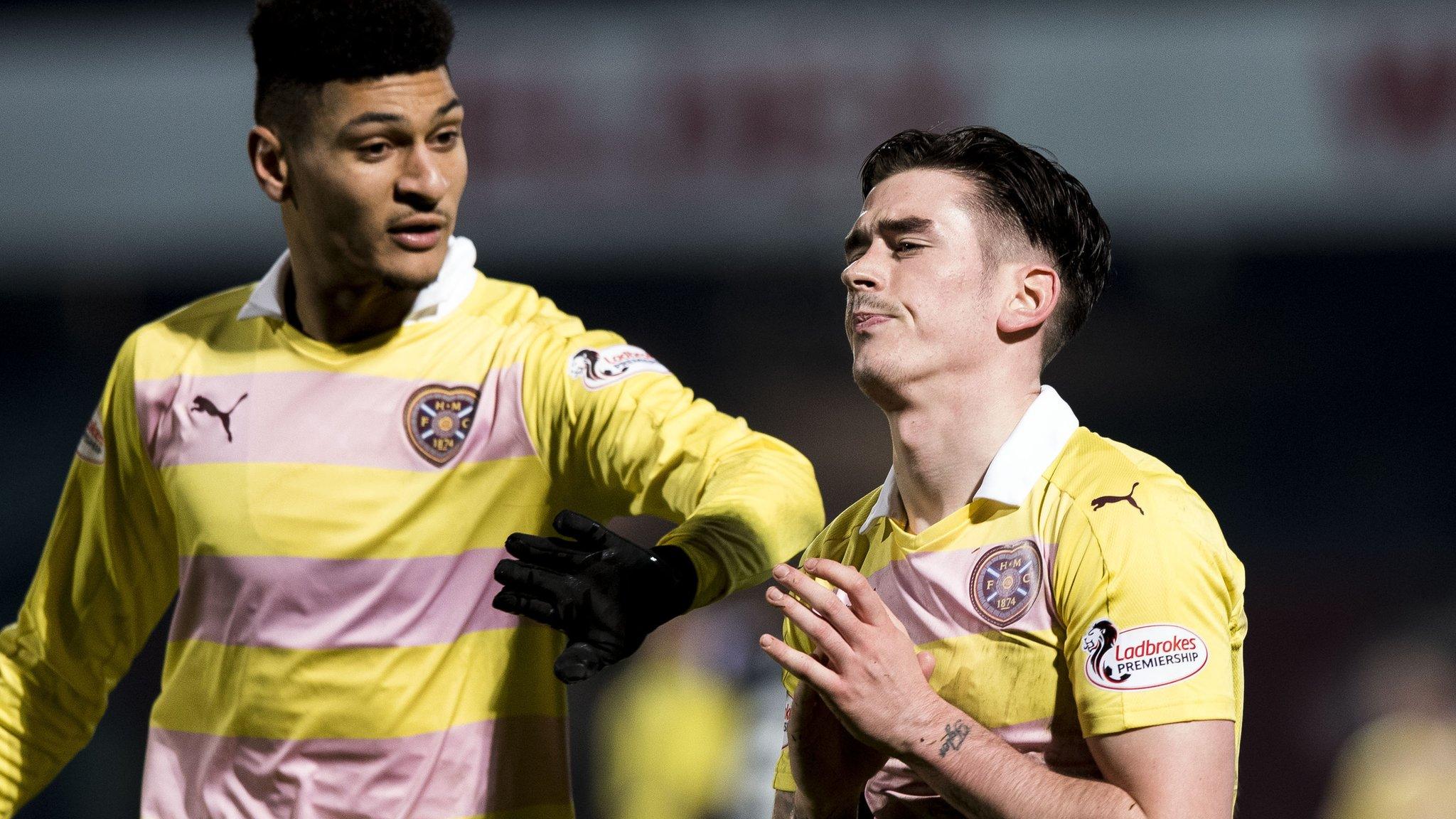 Jamie Walker is consoled by Bjorn Johnsen after missing a late penalty