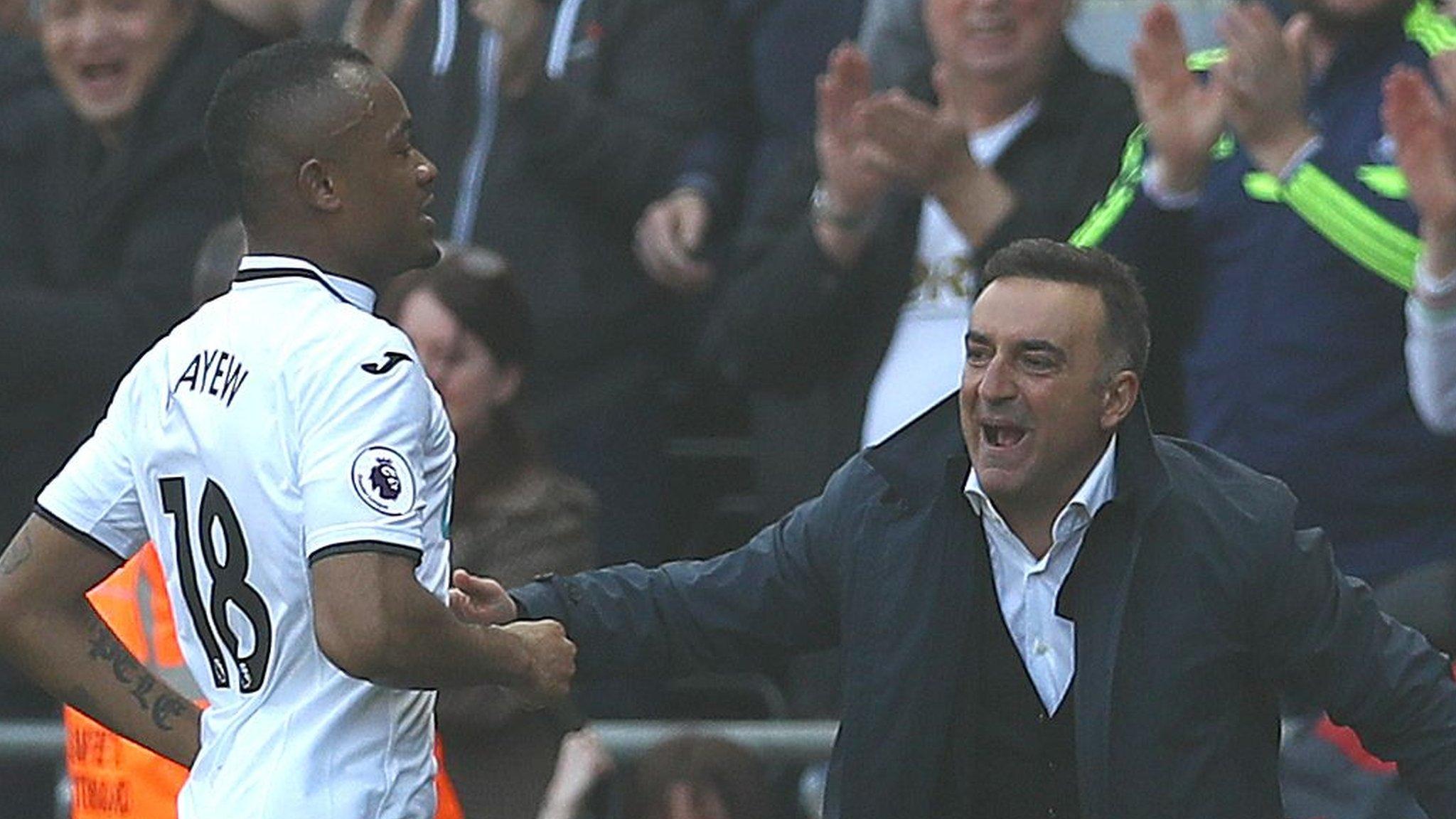 Jordan Ayew celebrates his equaliser with Swansea City boss Carlos Carvalhal